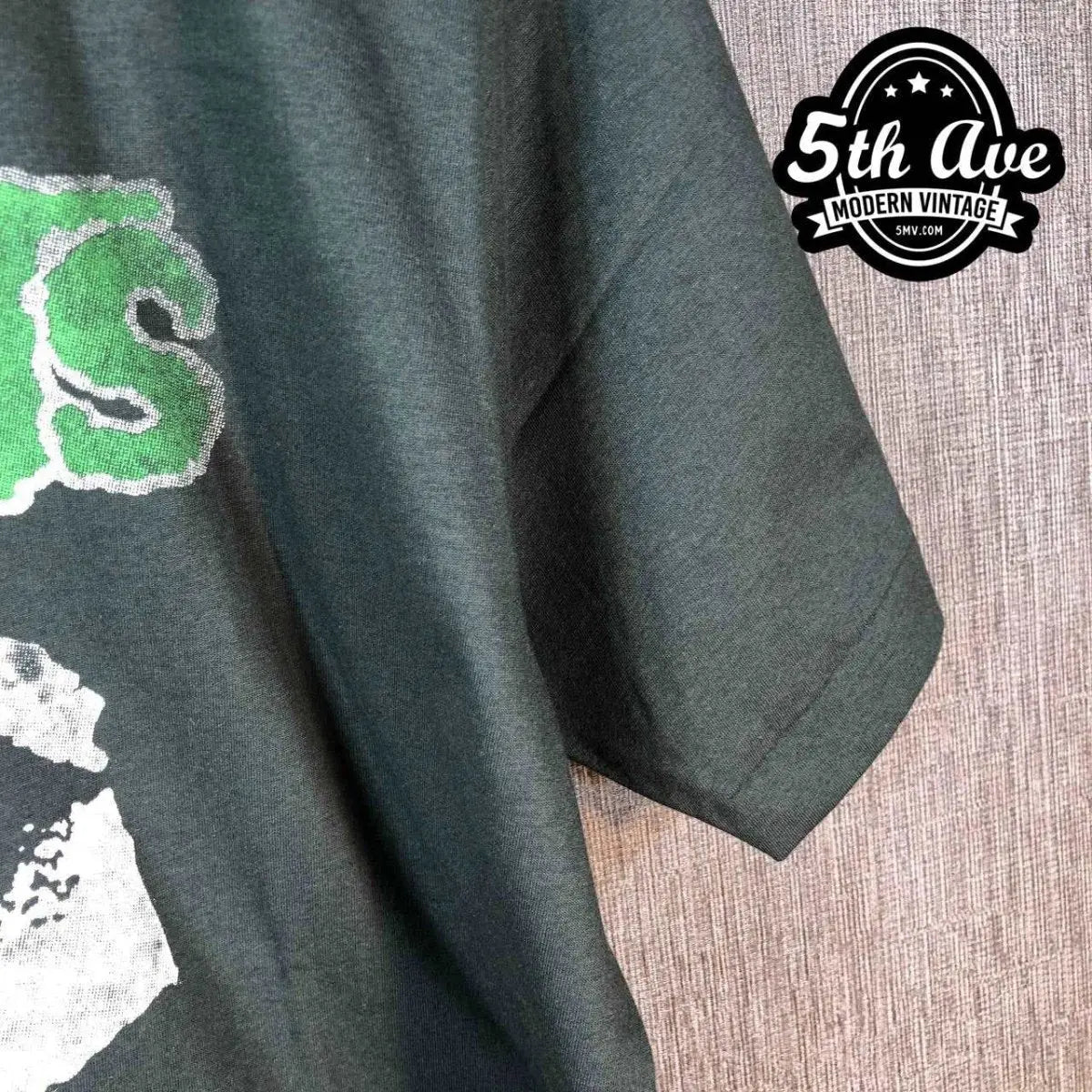 Model wearing Misfits – Green Logo Crimson Ghost Skull vintage band tee