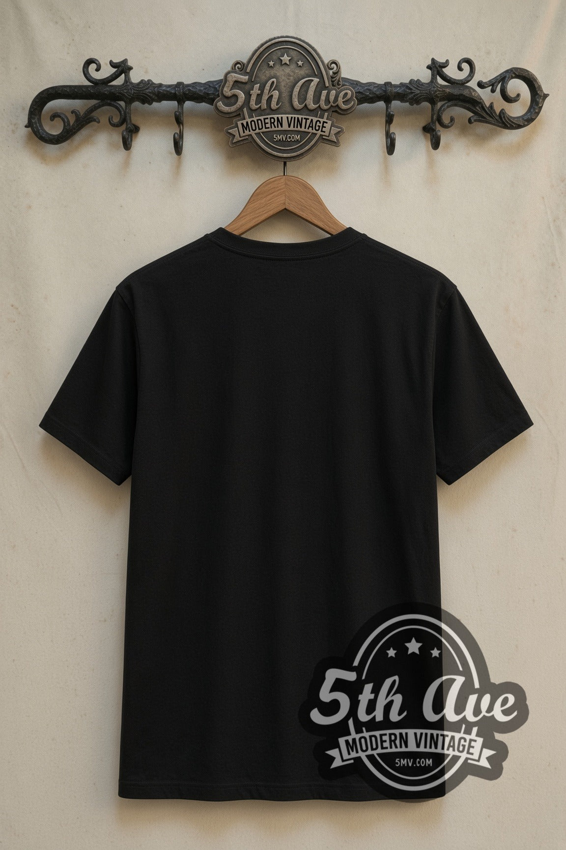 Plain black back of Monster Hunter Nergigante double stitched tee on rack