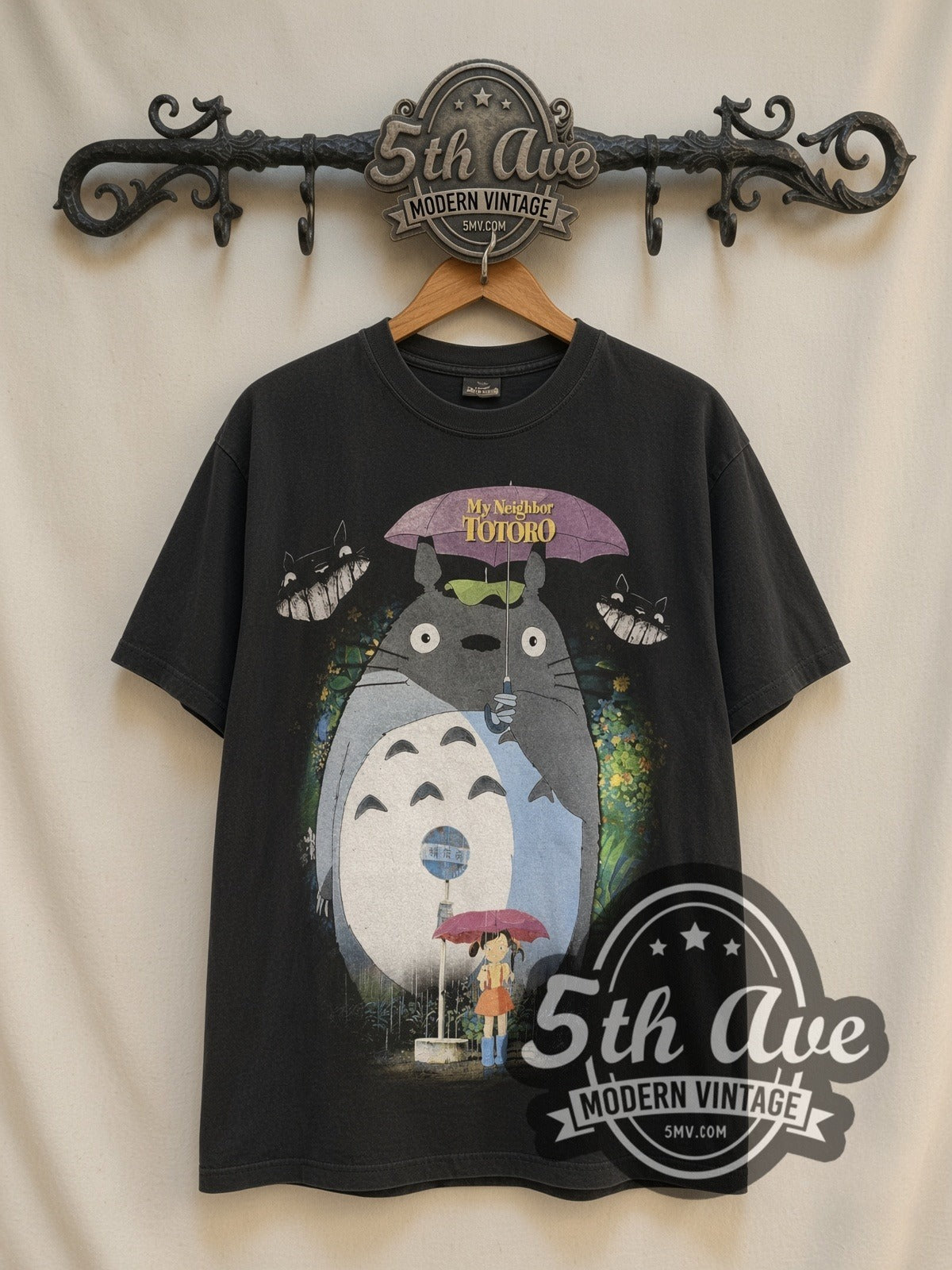 My Neighbor Totoro Bus Stop vintage movie t-shirt, front view on a display rack