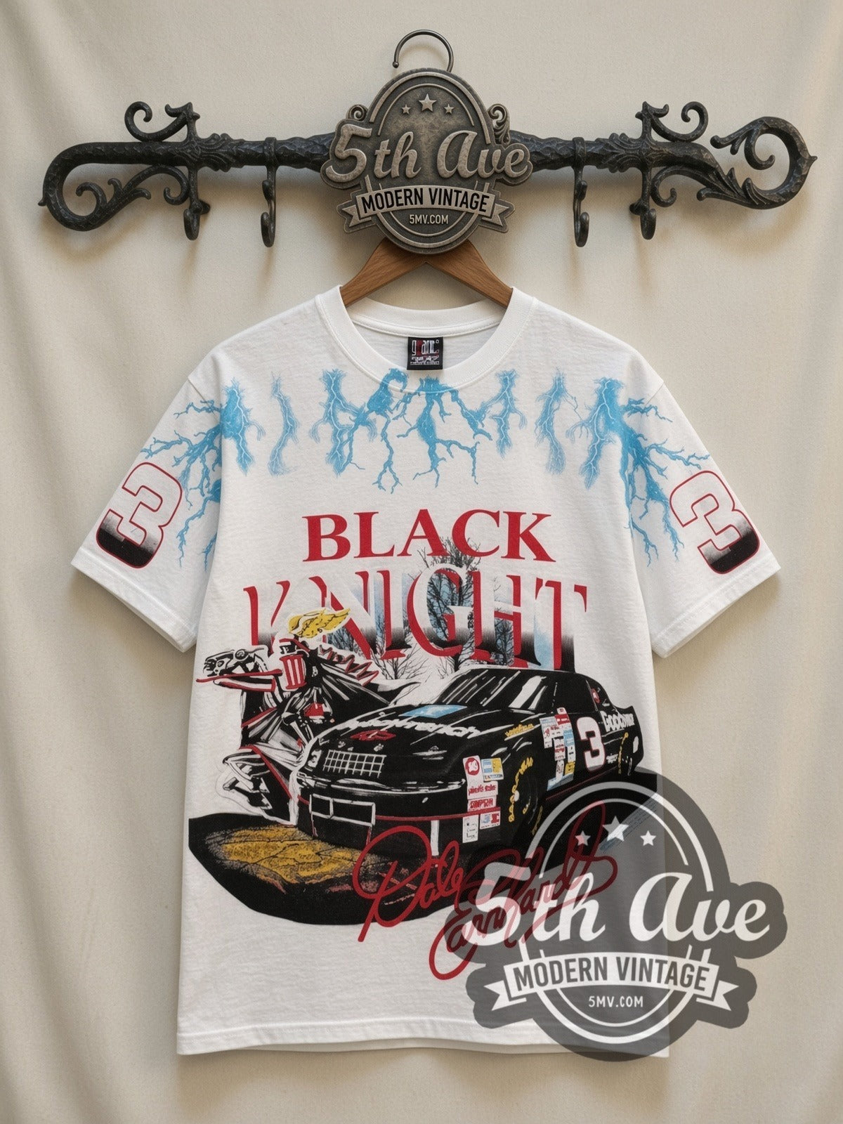 NASCAR Dale Earnhardt #3 Black Knight Lightning all-over-print vintage NASCAR t-shirt in white, front view on a display rack
