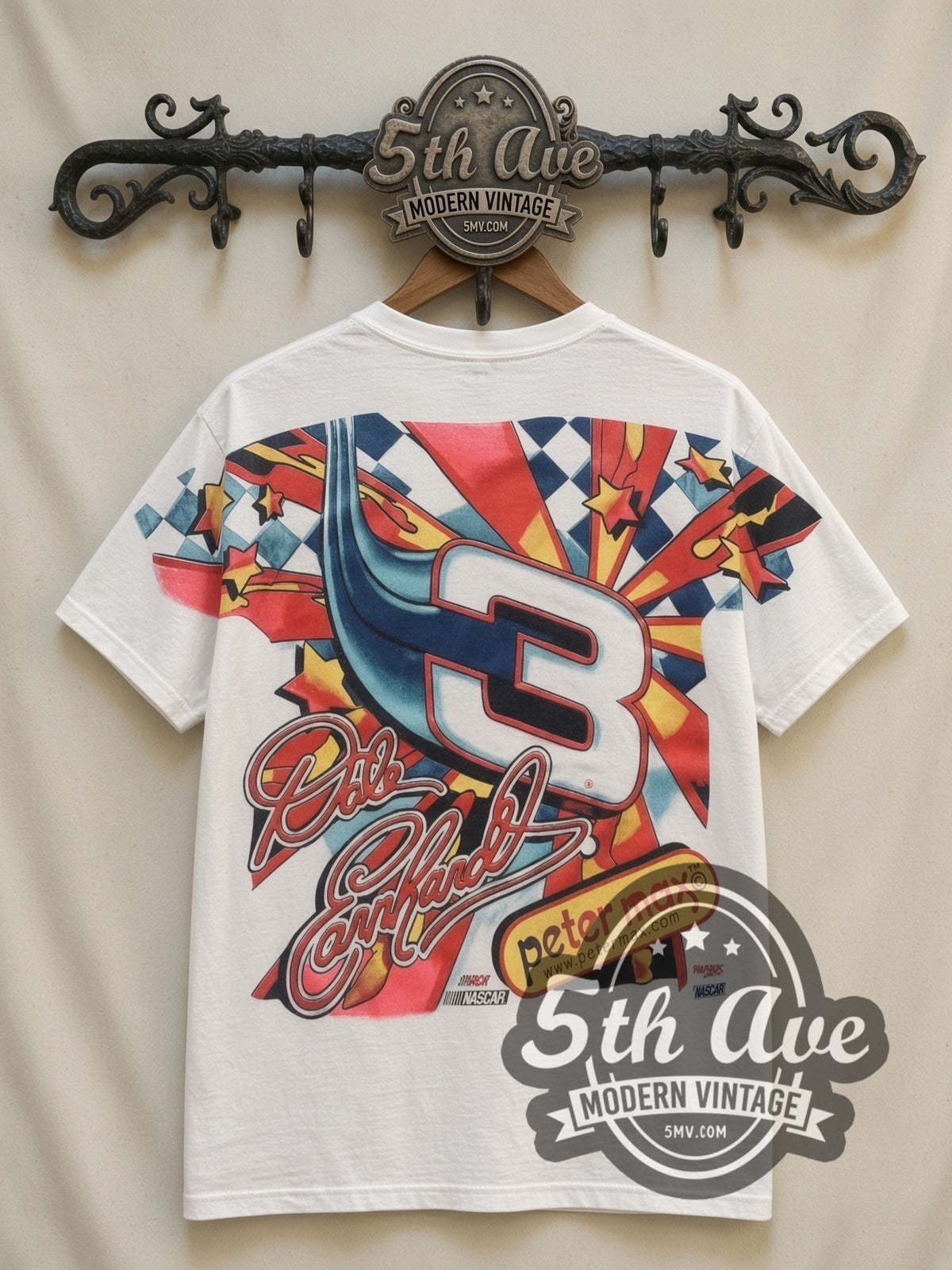 NASCAR Dale Earnhardt #3 Maximum Velocity Peter Max all-over-print vintage NASCAR t-shirt, back view on a display rack