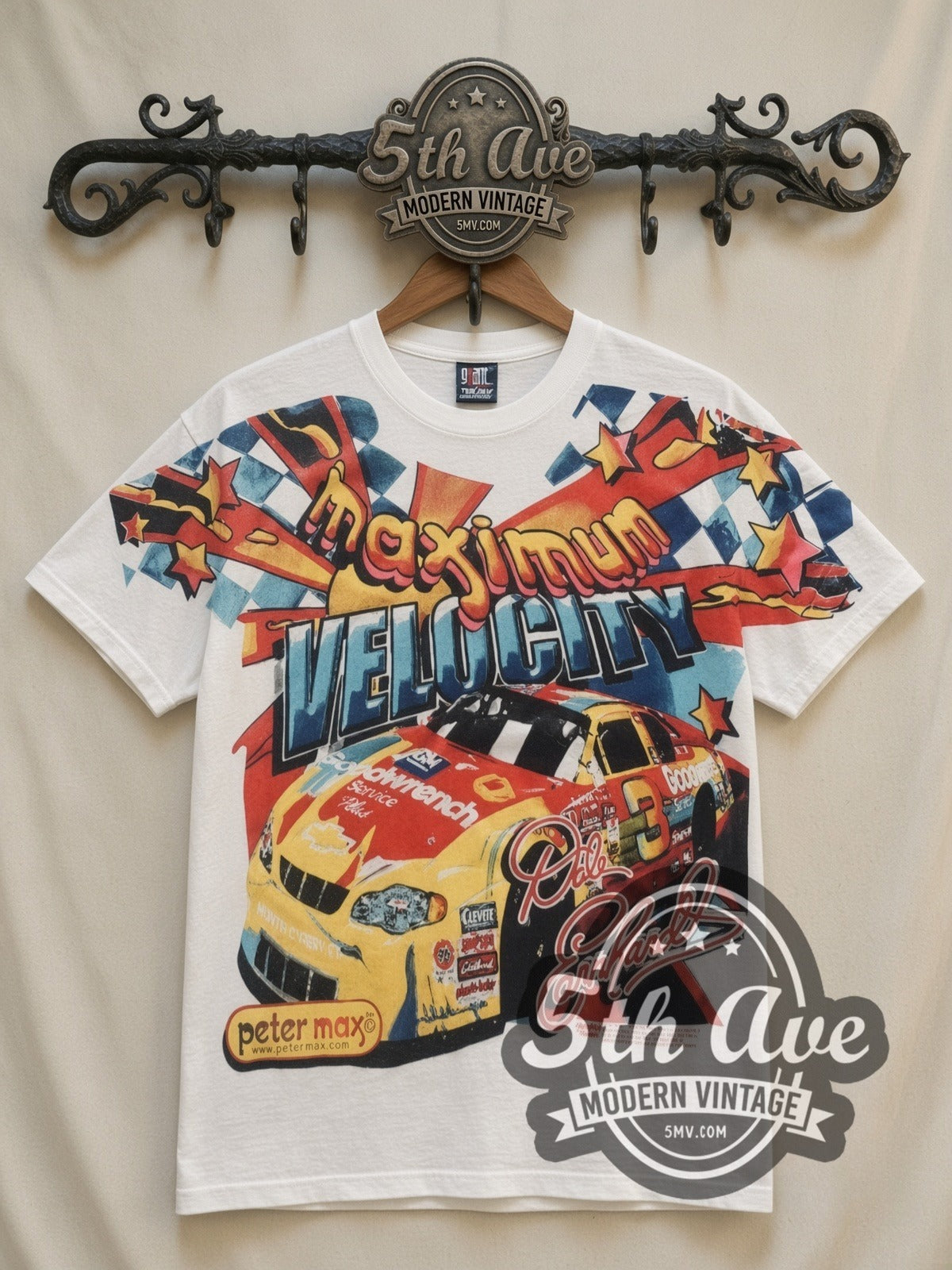 NASCAR Dale Earnhardt #3 Maximum Velocity Peter Max all-over-print vintage NASCAR t-shirt, front view on a display rack