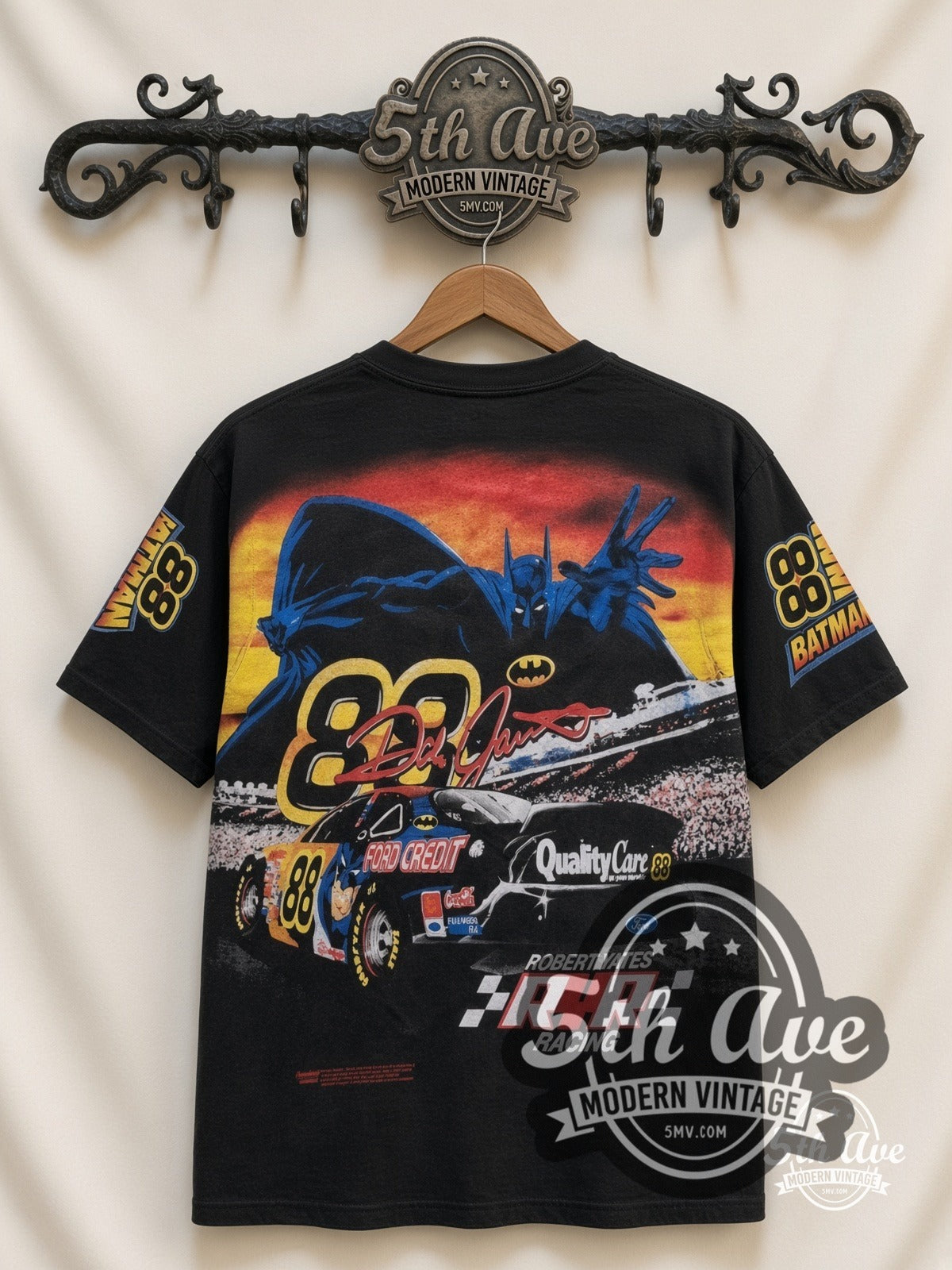NASCAR Dale Jarrett #88 Batman Forever all-over-print vintage NASCAR t-shirt in black, back view on a display rack