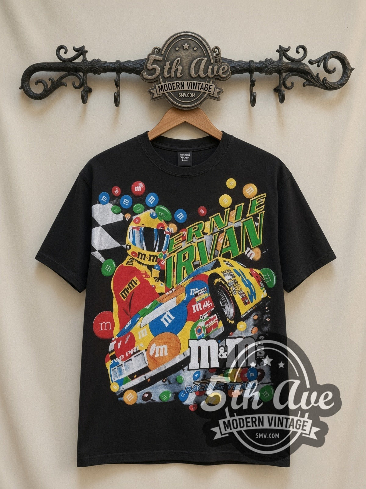 NASCAR Ernie Irvan #36 M&M's Angled Car all-over-print vintage NASCAR t-shirt in black, front view on a display rack