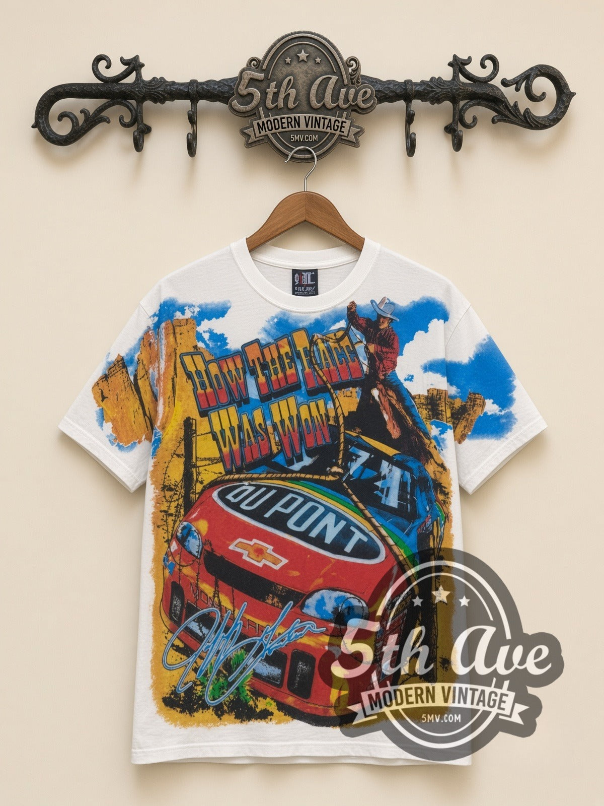 NASCAR Jeff Gordon #24 How The West Was Won all-over-print vintage NASCAR t-shirt in white, front view on a display rack