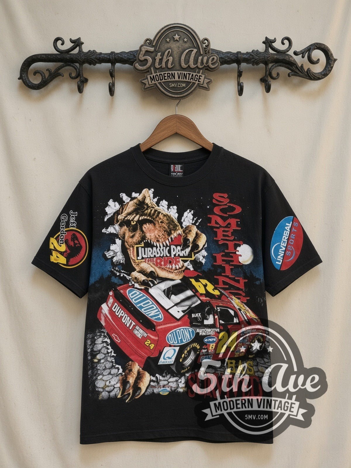 NASCAR Jeff Gordon #24 Jurassic Park The Ride all-over-print vintage NASCAR t-shirt in black, front view on a display rack