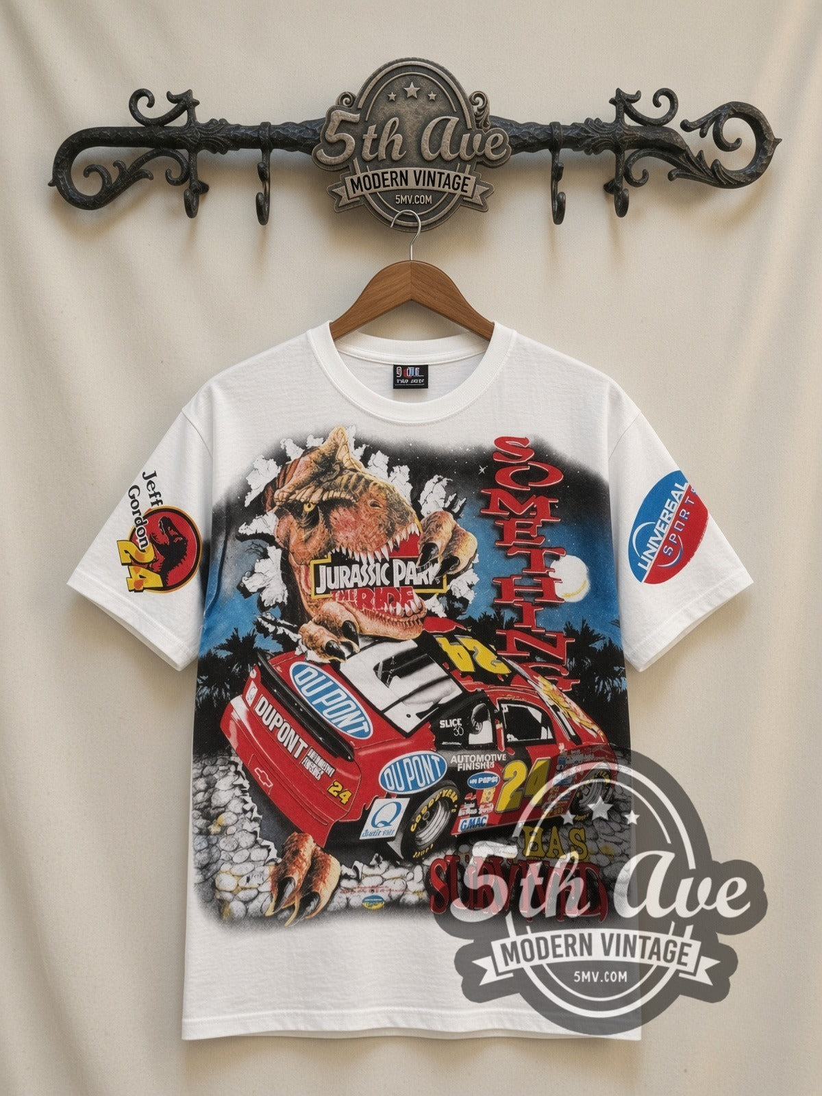 NASCAR Jeff Gordon #24 Jurassic Park The Ride all-over-print vintage NASCAR t-shirt in white, front view on a display rack