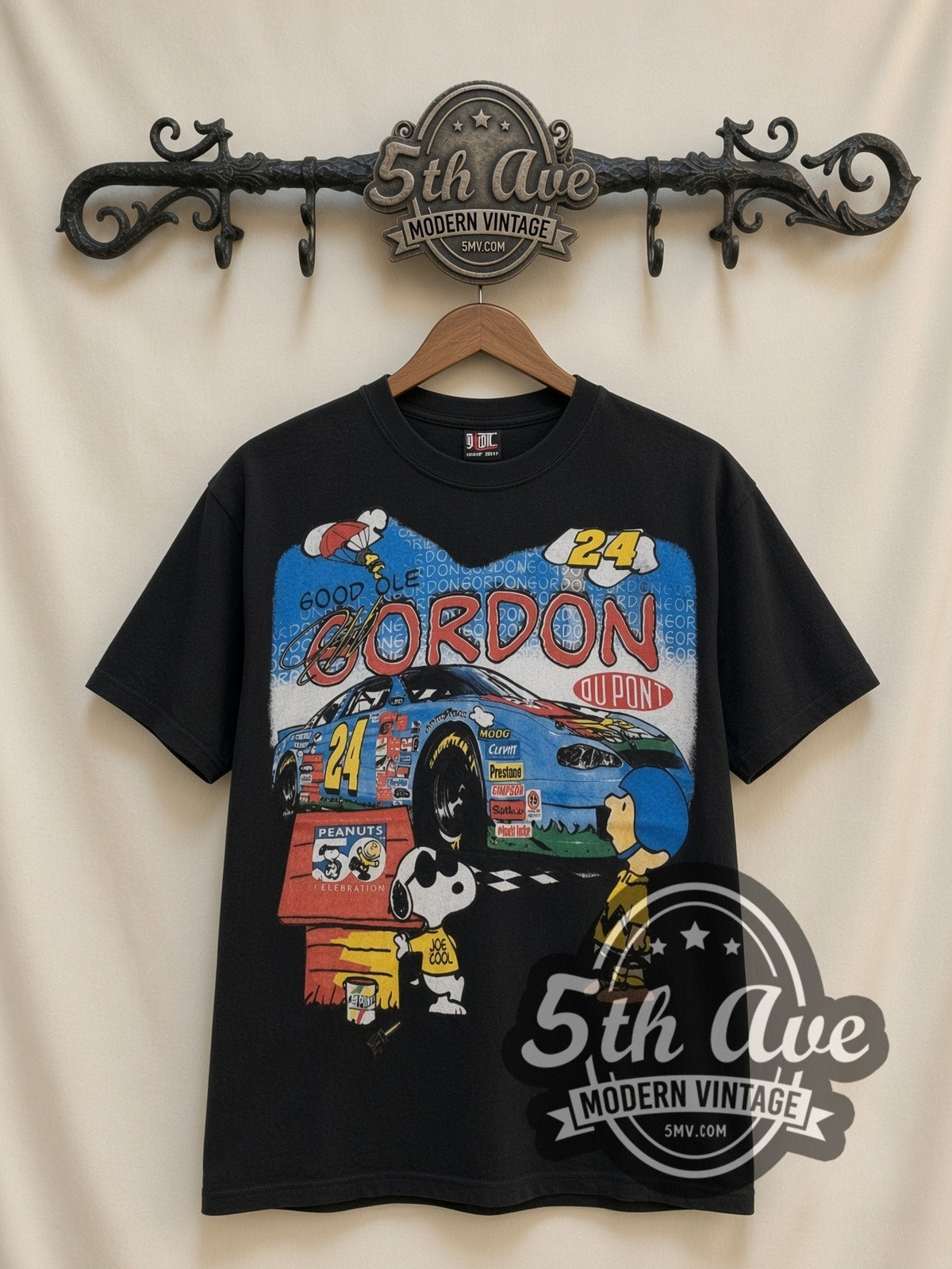 NASCAR Jeff Gordon #24 Good Ol Gordon Peanuts Snoopy all-over-print vintage NASCAR t-shirt, front view on a display rack