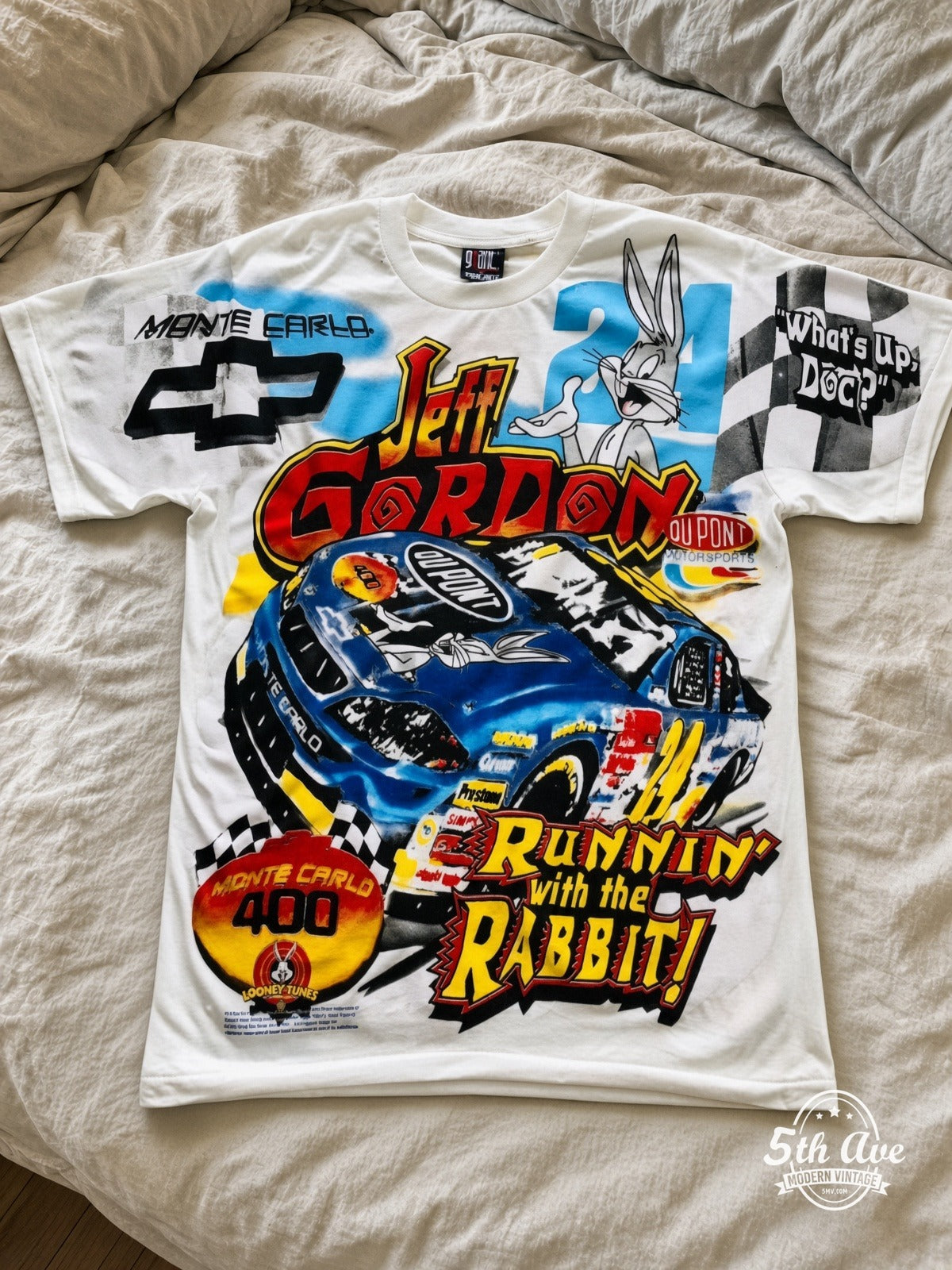 NASCAR Jeff Gordon 24 Runnin With The Rabbit Bugs vintage tee laid on bed