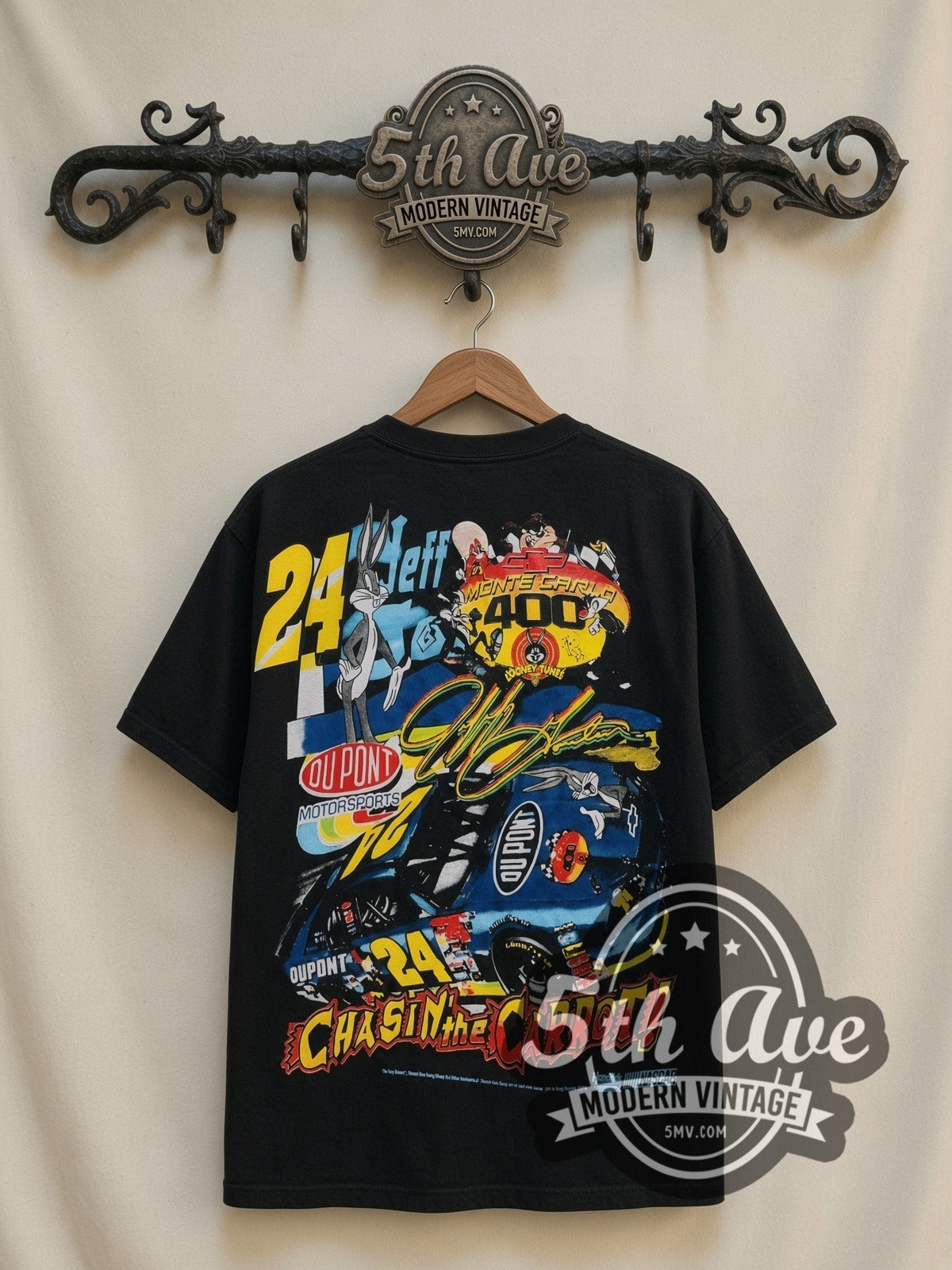 NASCAR Jeff Gordon #24 Runnin' With The Rabbit Bugs Bunny all-over-print vintage NASCAR t-shirt, back view on a display rack