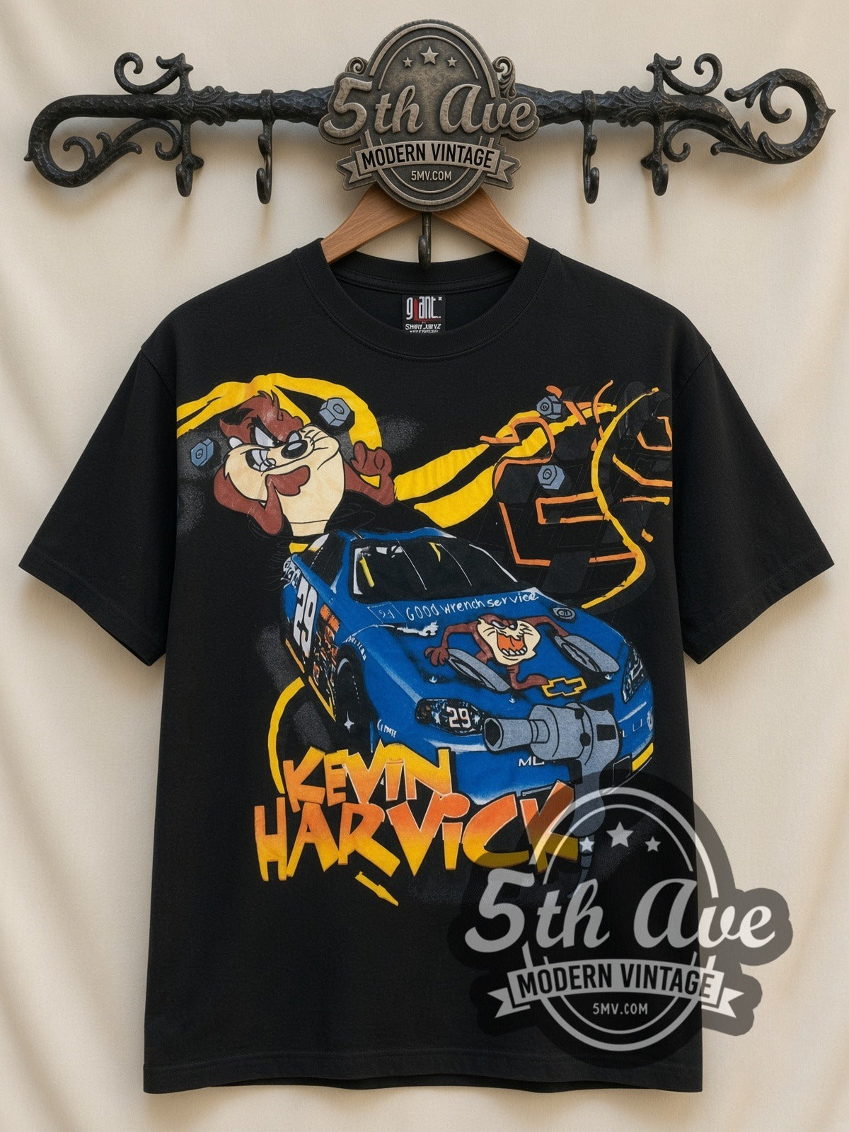NASCAR Kevin Harvick #29 Taz Looney Tunes all-over-print vintage NASCAR t-shirt in black, front view on a display rack