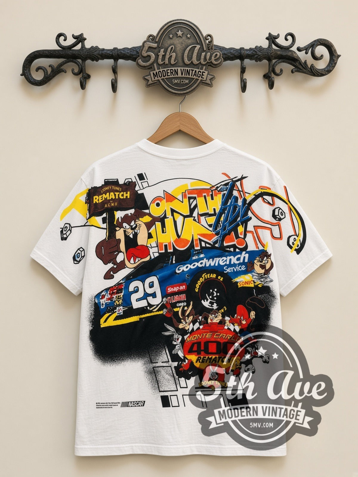 NASCAR Kevin Harvick #29 Taz Looney Tunes all-over-print vintage NASCAR t-shirt in white, back view on a display rack
