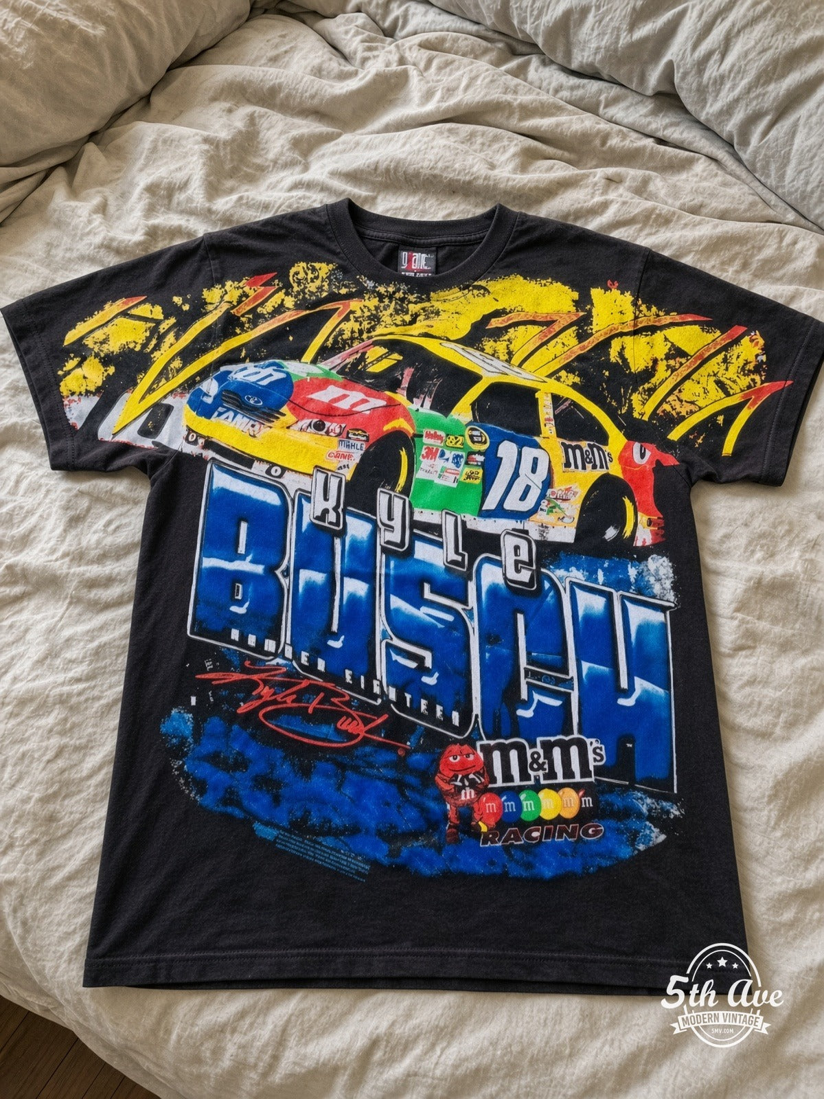 NASCAR Kyle Busch 18 M&Ms Block Name vintage tee laid on bed