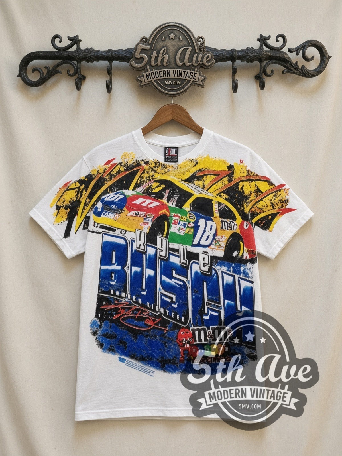 NASCAR Kyle Busch #18 M&M's Block Name all-over-print vintage NASCAR t-shirt in white, front view on a display rack