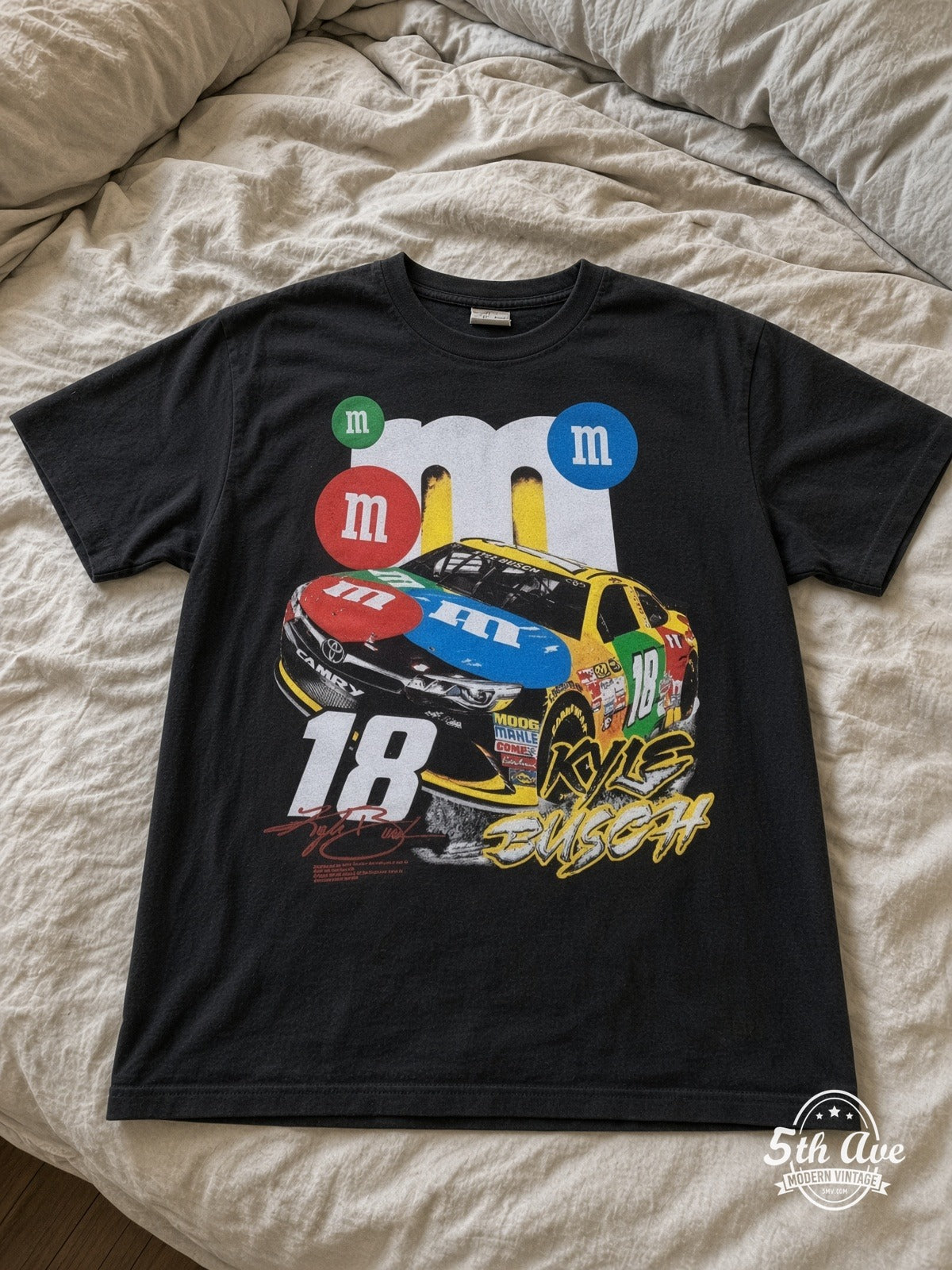 NASCAR Kyle Busch 18 M&Ms Characters vintage tee laid on bed