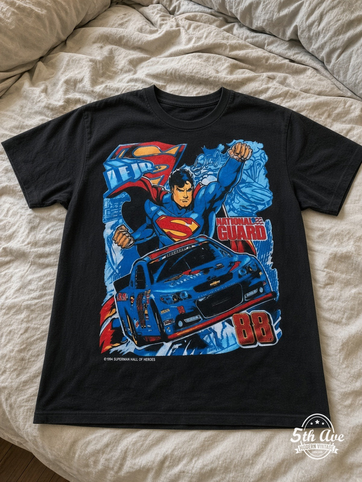 NASCAR Superman Dale Jr 88 National Guard vintage tee laid on bed
