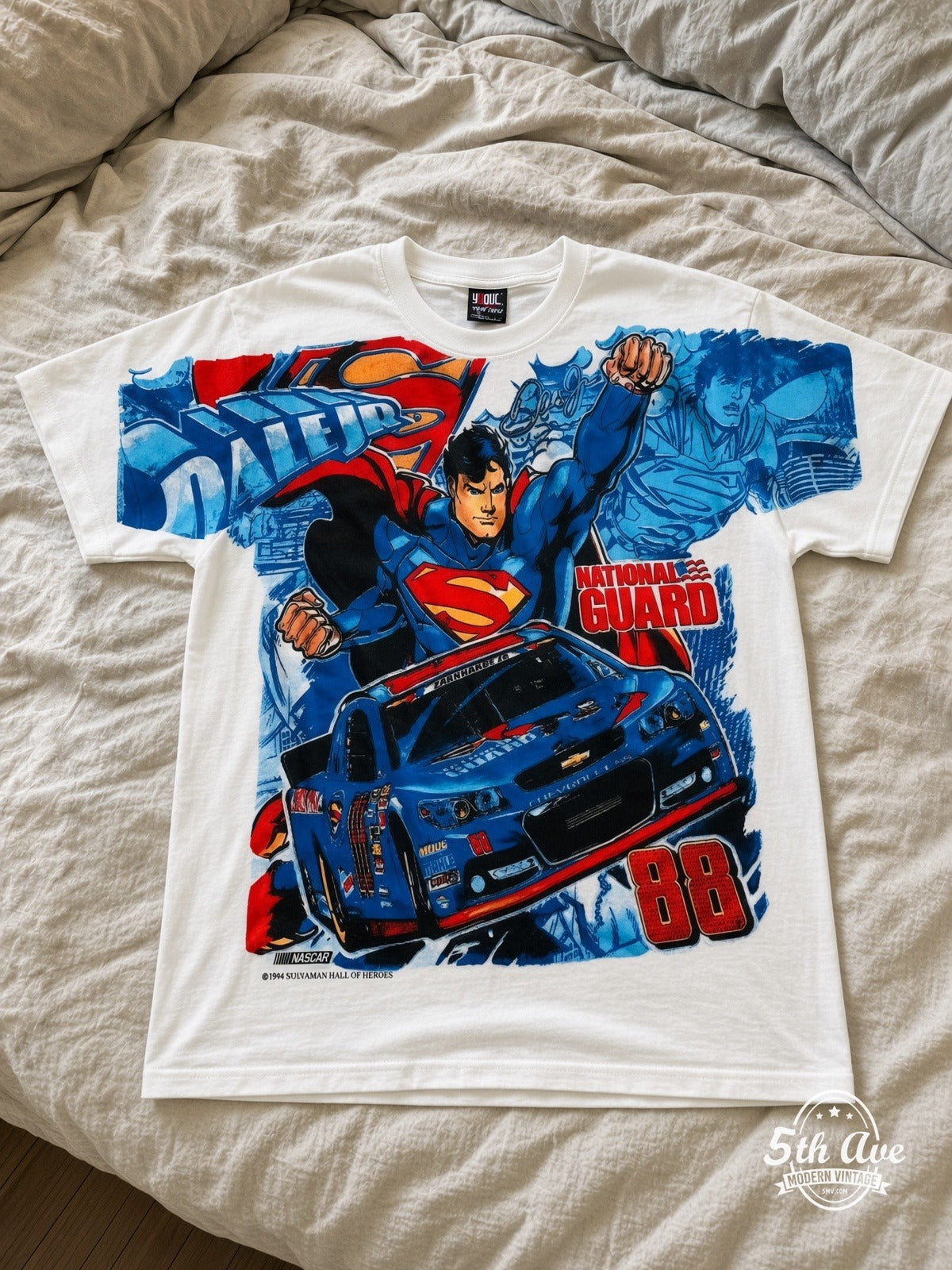 NASCAR Superman Dale Jr 88 National Guard vintage tee laid on bed