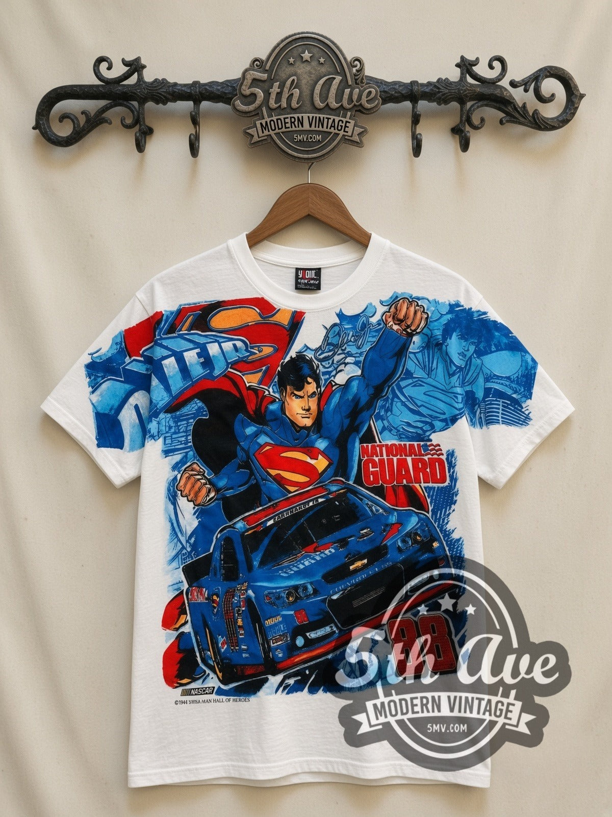 NASCAR Superman & Dale Earnhardt Jr. #88 National Guard all-over-print vintage NASCAR t-shirt, front view on a display rack