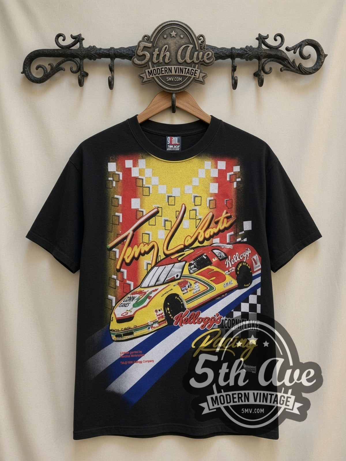 NASCAR Terry Labonte #5 Kellogg's Corn Flakes all-over-print vintage NASCAR t-shirt in black, front view on a display rack