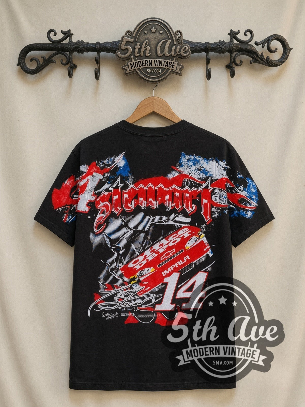 NASCAR Tony Stewart #14 Mobil 1 all-over-print vintage NASCAR t-shirt, back view on a display rack