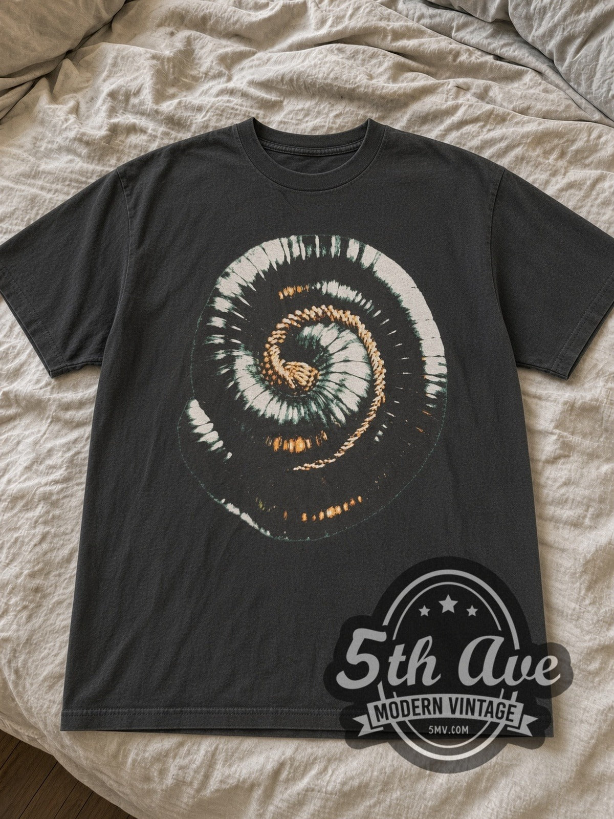 Black Nine Inch Nails Closer to God tee laid flat on linen bed
