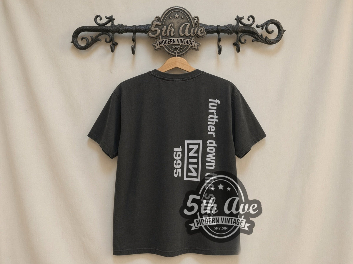 Nine Inch Nails Further Down the Spiral vintage band t-shirt, back view on a display rack