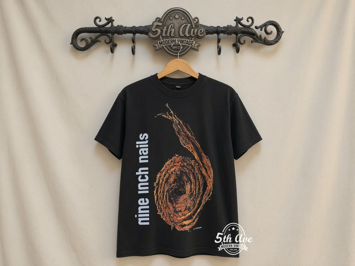 Nine Inch Nails Black Distressed Crew Neck T-Shirt: Embodying Industrial Rock Style vintage tee on 5th Ave cream rack — front