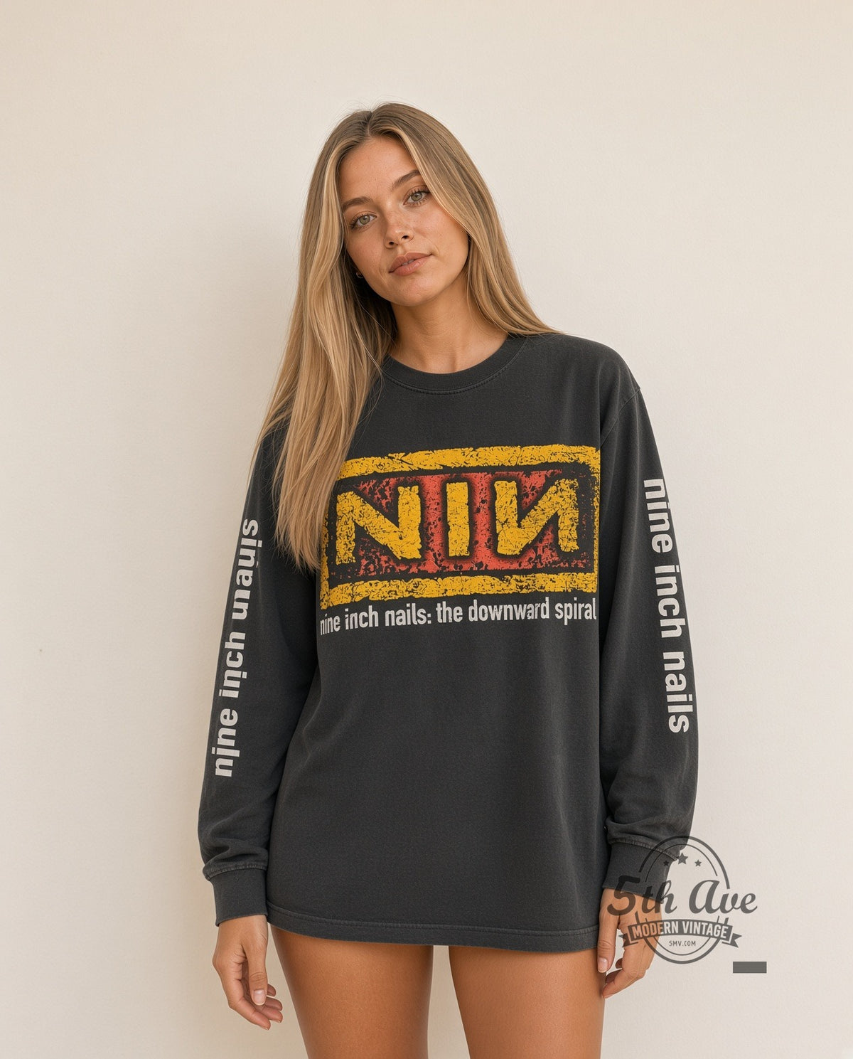 Model wearing Nine Inch Nails Downward Spiral Yellow NIN Logo Long Sleeve vintage band t-shirt