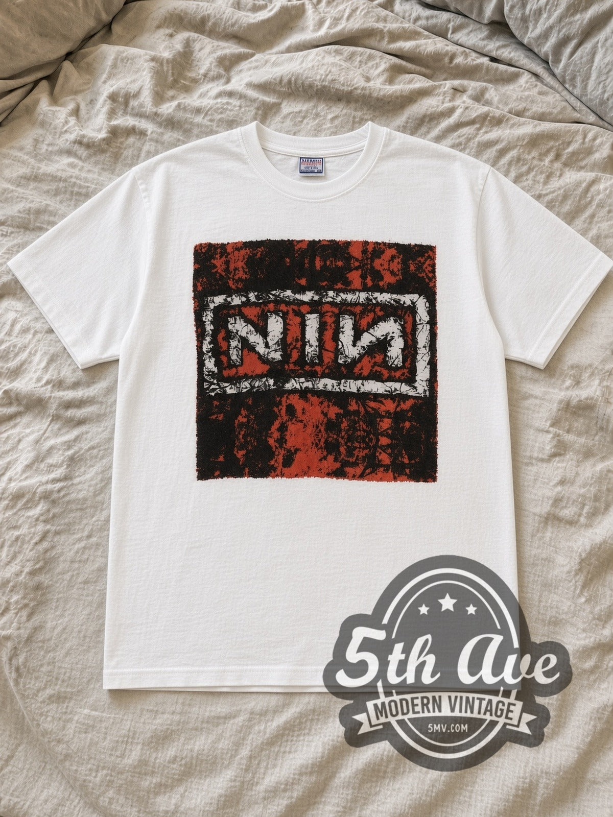 Nine Inch Nails In Concert White vintage band tee laid flat