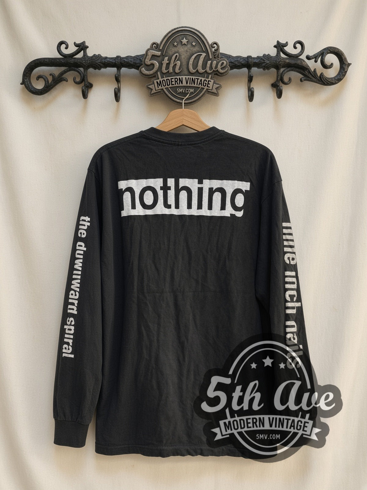 Nine Inch Nails The Downward Spiral vintage band long sleeve t-shirt, back view on a display rack