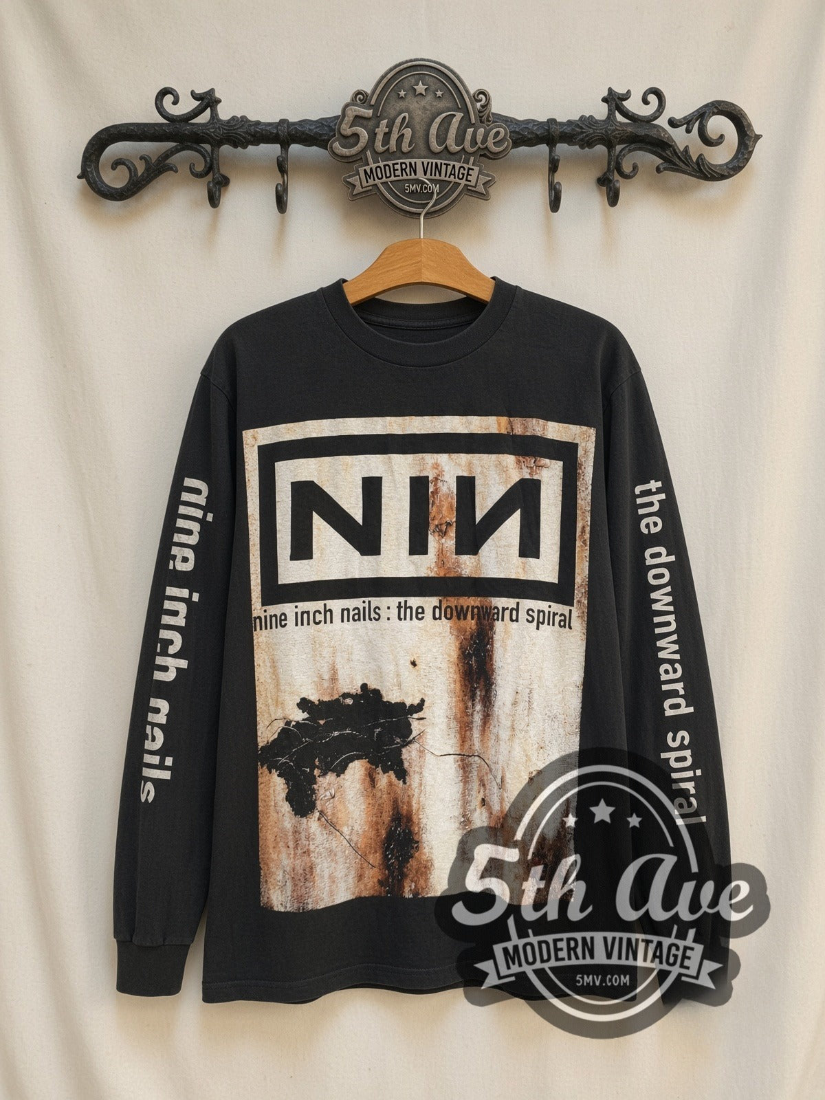 Nine Inch Nails The Downward Spiral vintage band long sleeve t-shirt, front view on a display rack