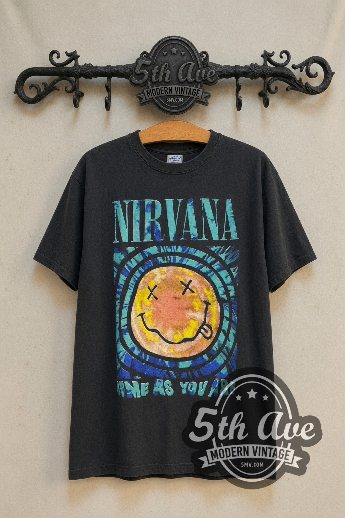 Nirvana Come As You Are Psychedelic Smiley & Box Logo band t-shirt front on 5th Ave iron rack
