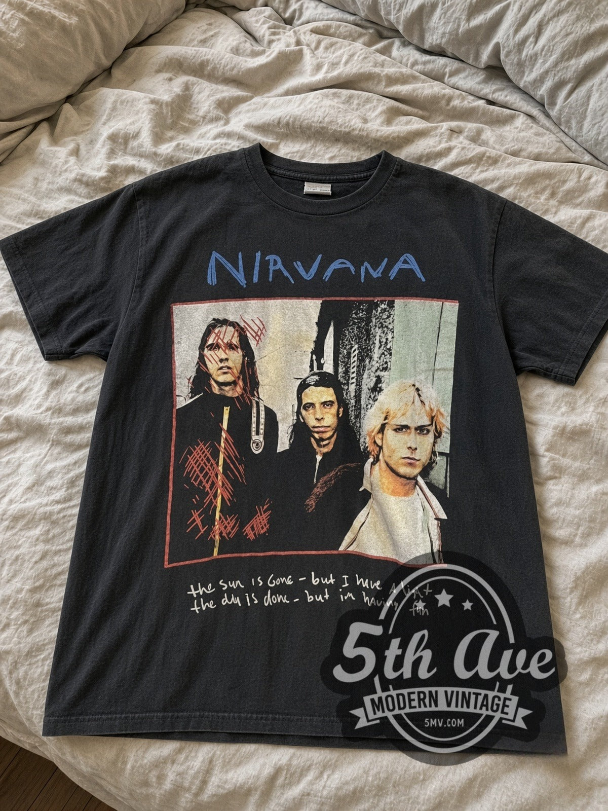 Nirvana Dumb / Oh Our Last and Final Name vintage band tee laid flat