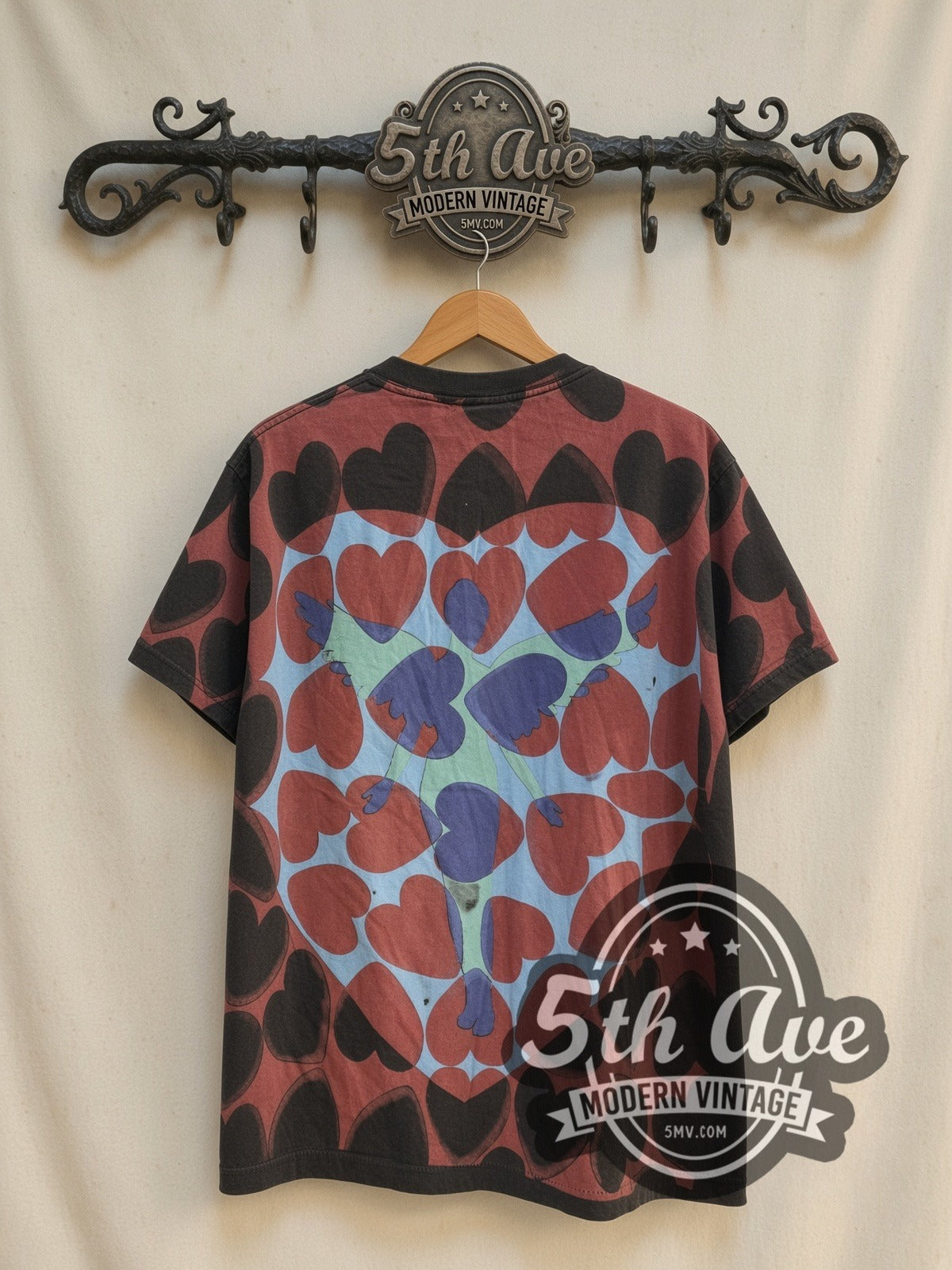 Nirvana Heart-Shaped Box / In Utero Hearts vintage band t-shirt, back view on a display rack