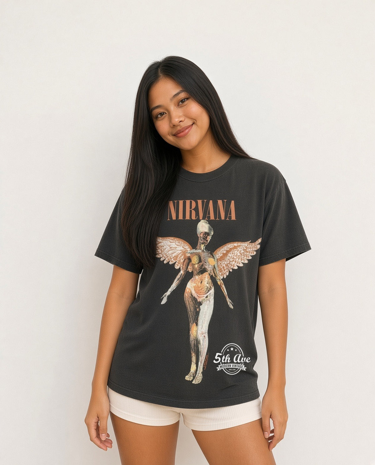 Model wearing Nirvana In Utero Anatomical Angel Peach vintage t-shirt
