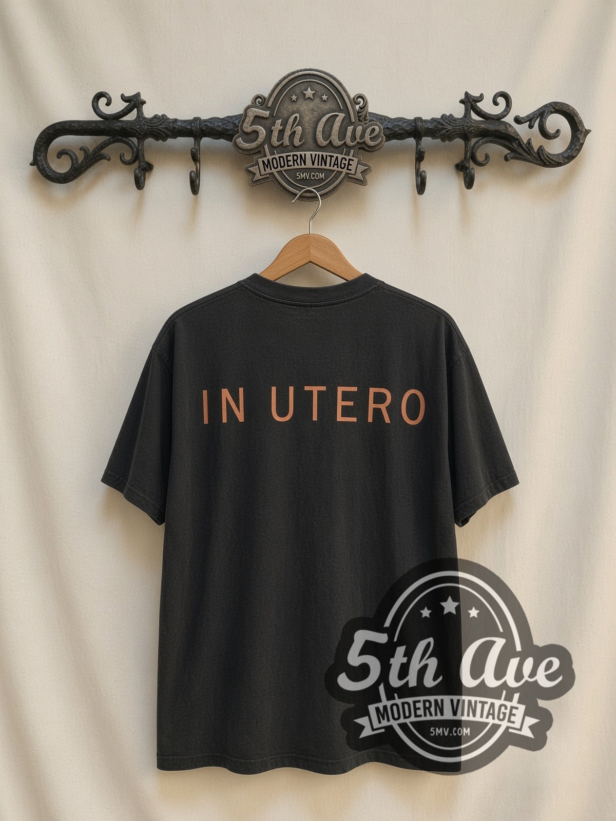 Nirvana In Utero Angel vintage band t-shirt, back view on a display rack