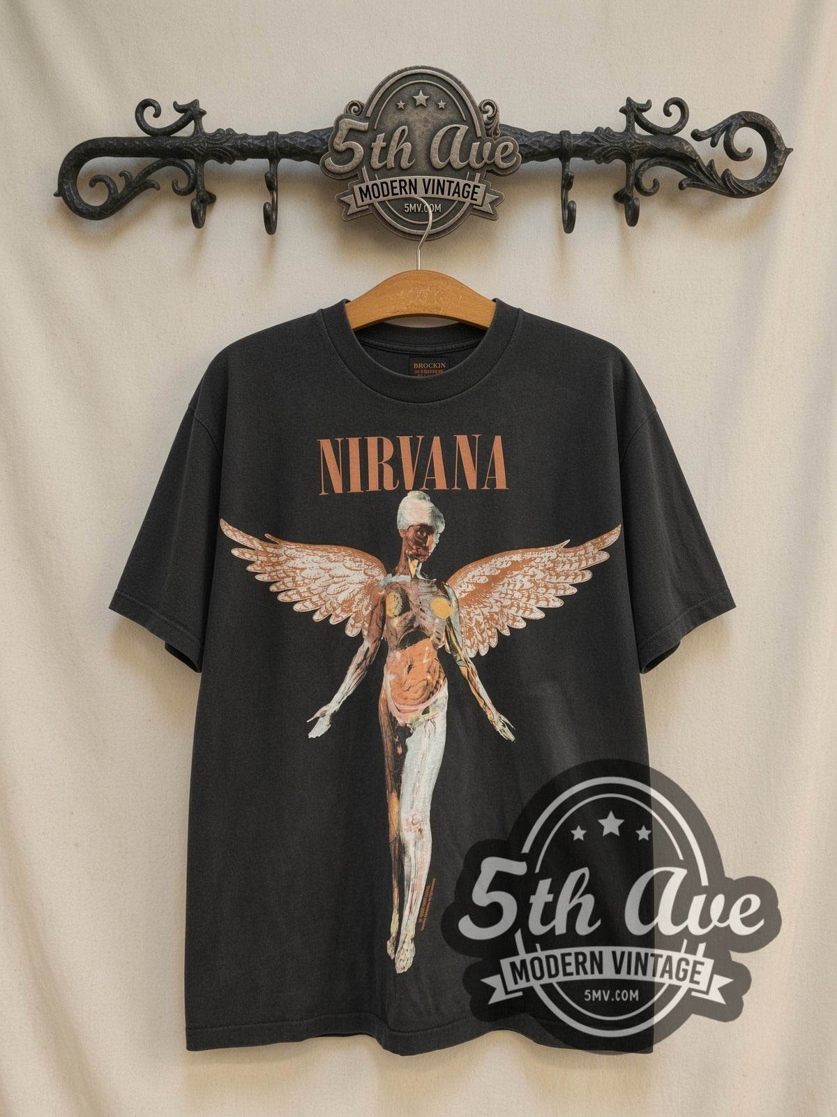 Nirvana In Utero Angel vintage band t-shirt, front view on a display rack