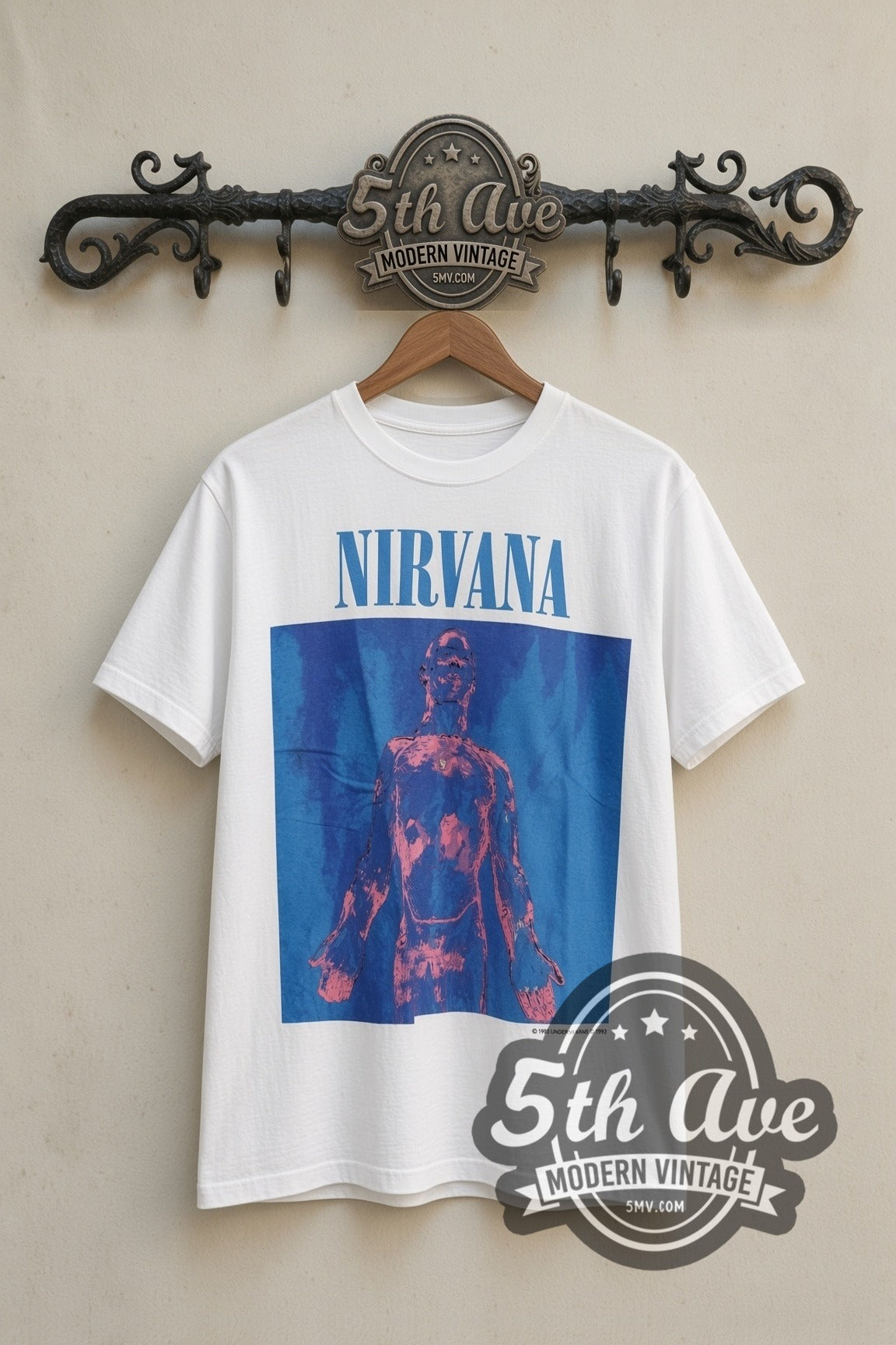 Nirvana Sliver vintage band t-shirt in white on the 5MV rack, front view: blue NIRVANA wordmark over the blue-and-red Sliver album art