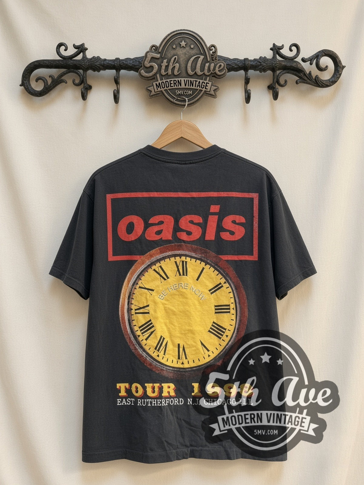 Oasis Be Here Now Tour 1998 vintage band t-shirt, back view on a display rack
