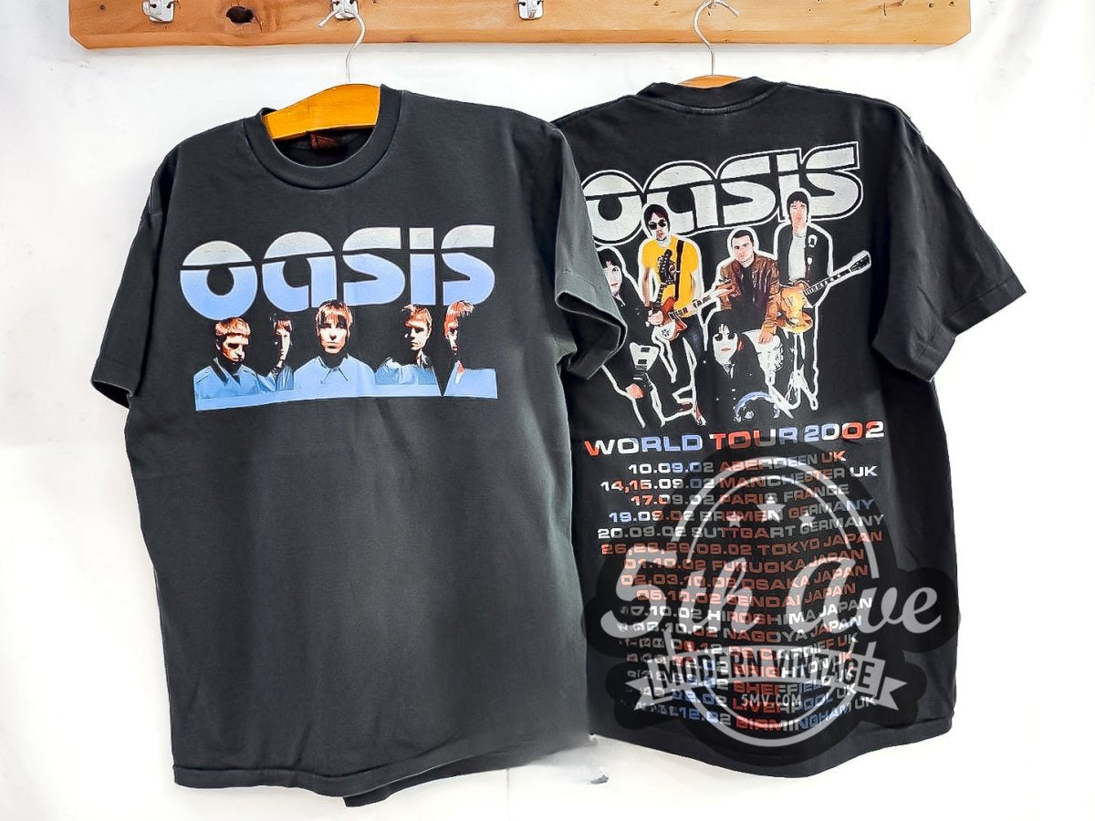 Oasis World Tour 2002 vintage band t-shirt, front view on a display rack