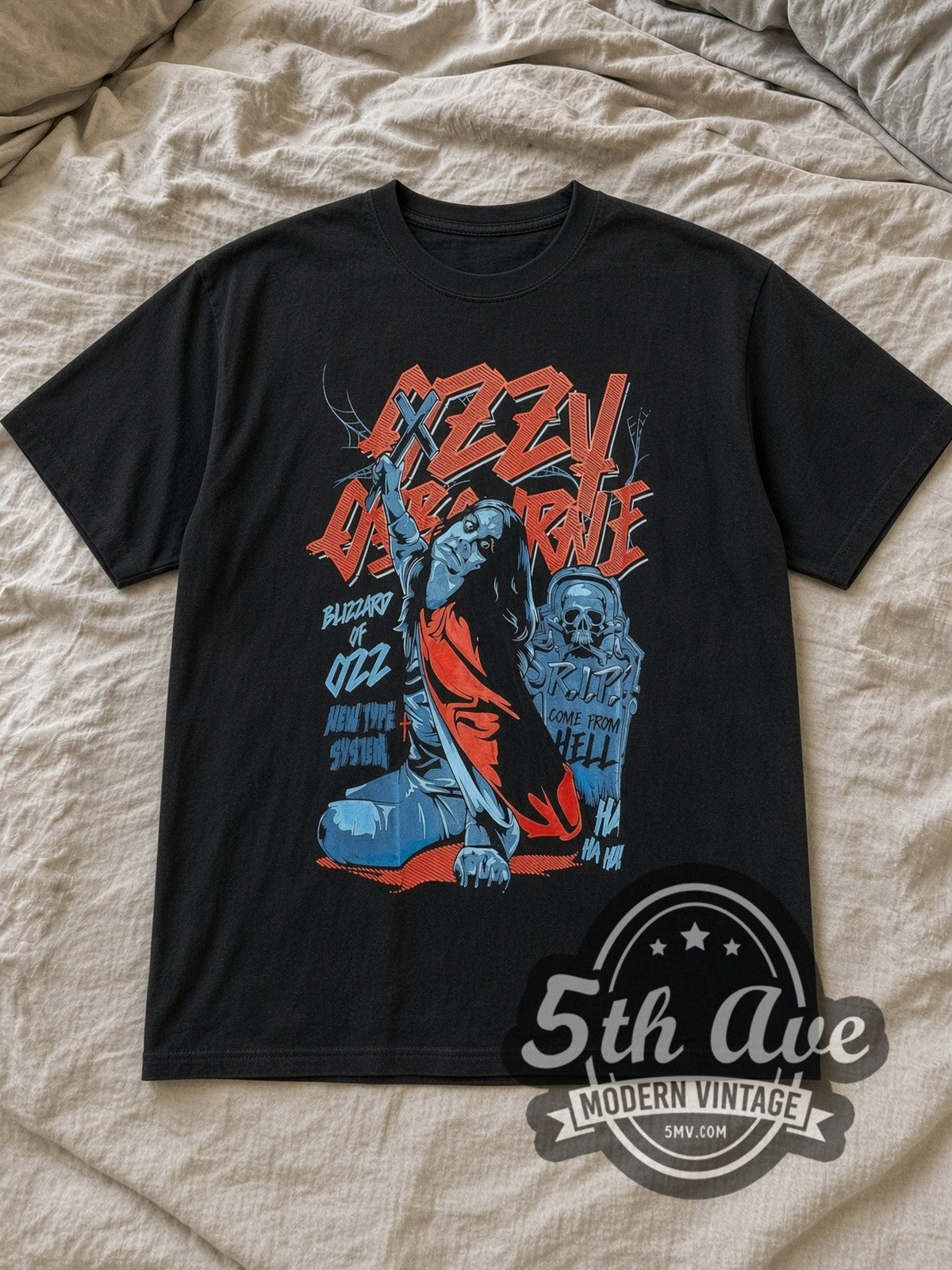 Black Ozzy Osbourne Blizzard of Ozz Vintage Band T-Shirt laid flat on a linen bed