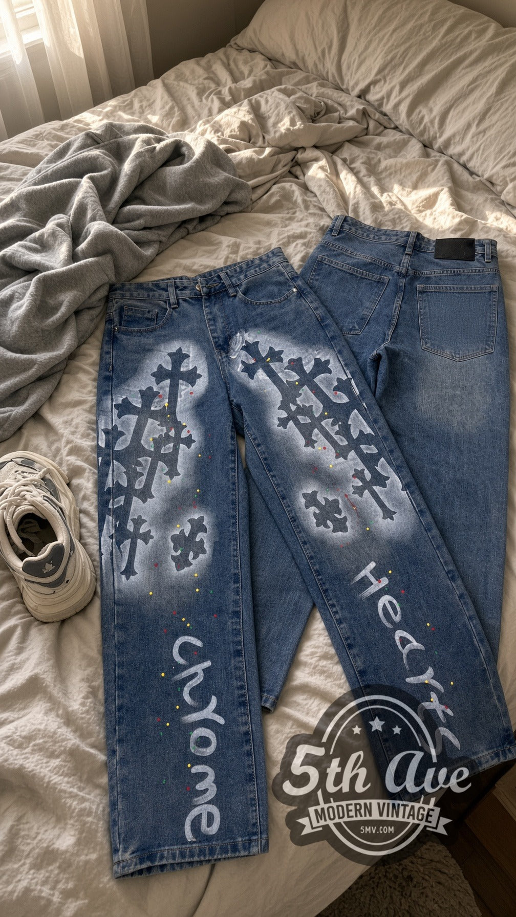 Gothic Cross Spray Paint Jeans – Vintage Streetwear vintage jeans laid on bed