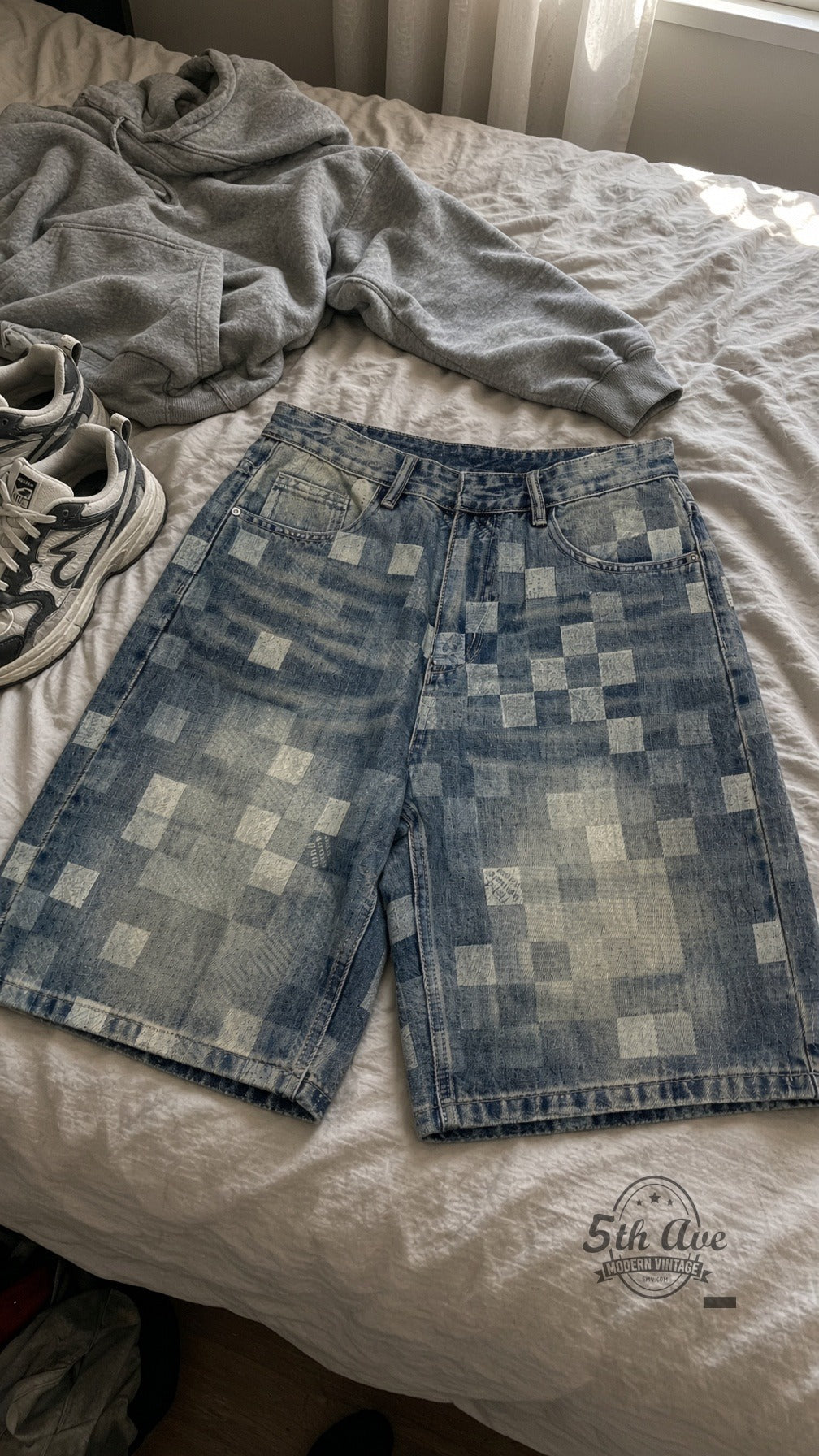 Pixel Checker Bleached Square Jorts laid on bed