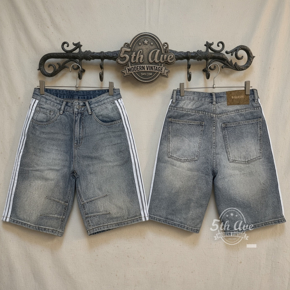 Light Wash Side Stripe Pintuck Jorts front and back on rack