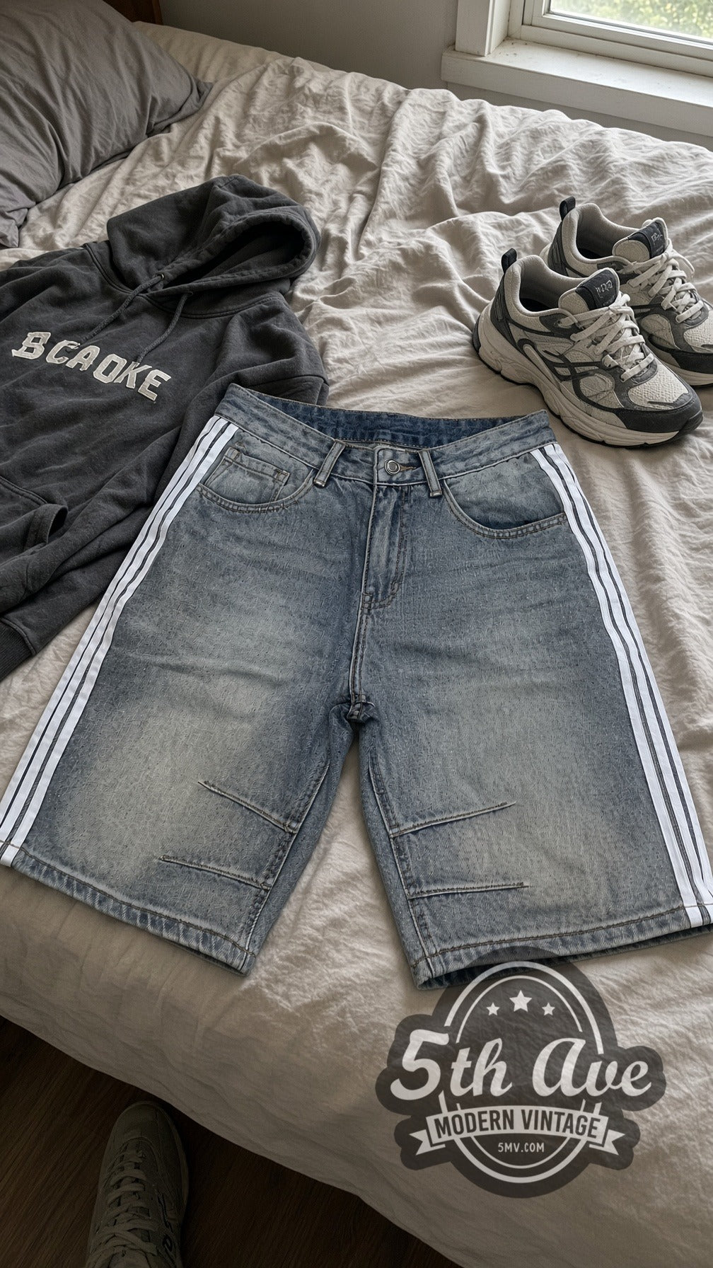 Light Wash Side Stripe Pintuck Jorts – Vintage Streetwear vintage jorts laid on bed