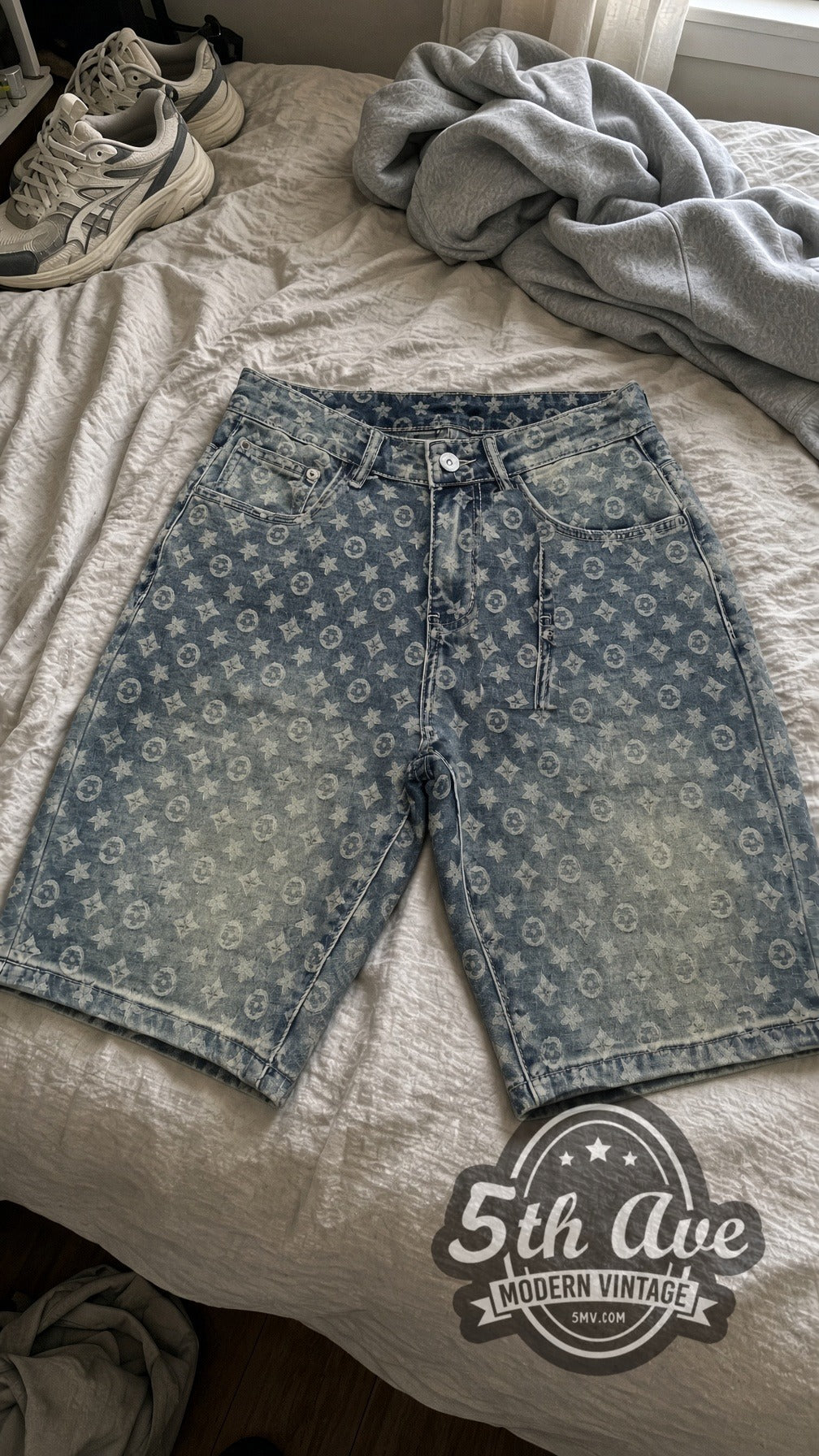 Dirty Wash Star Monogram Jorts – Vintage Streetwear vintage jorts laid on bed