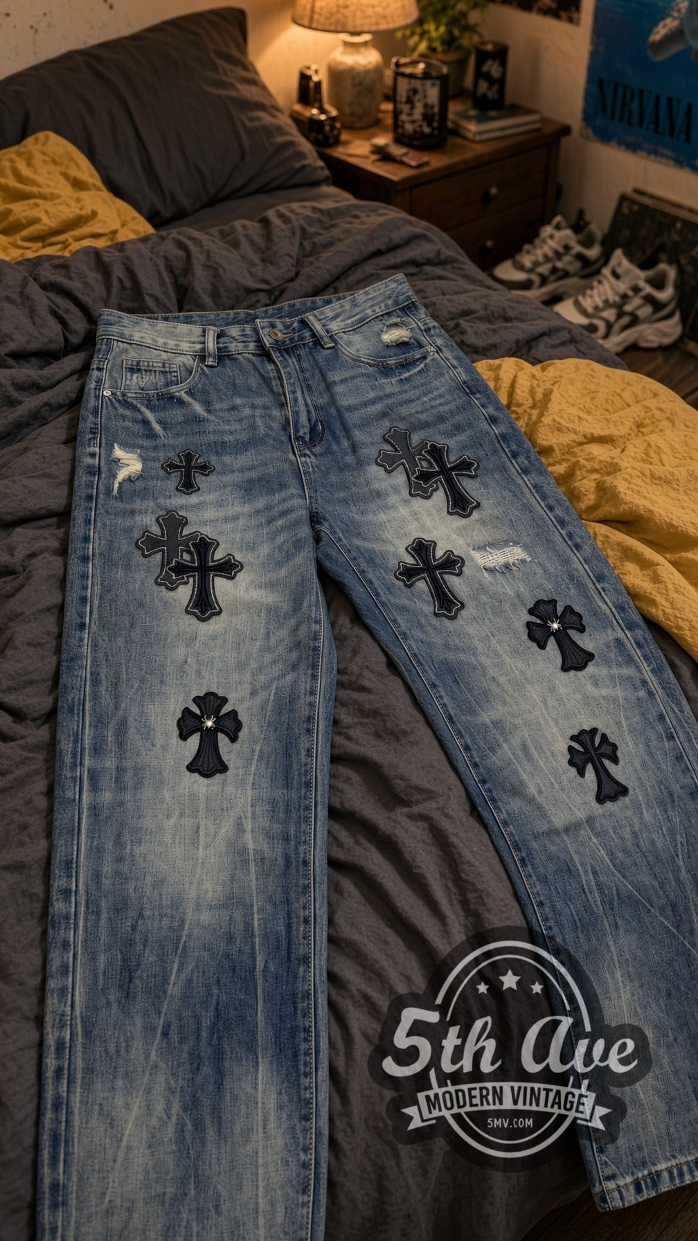 Black Gothic Cross Appliqué Jeans – Vintage Streetwear vintage jeans laid on bed
