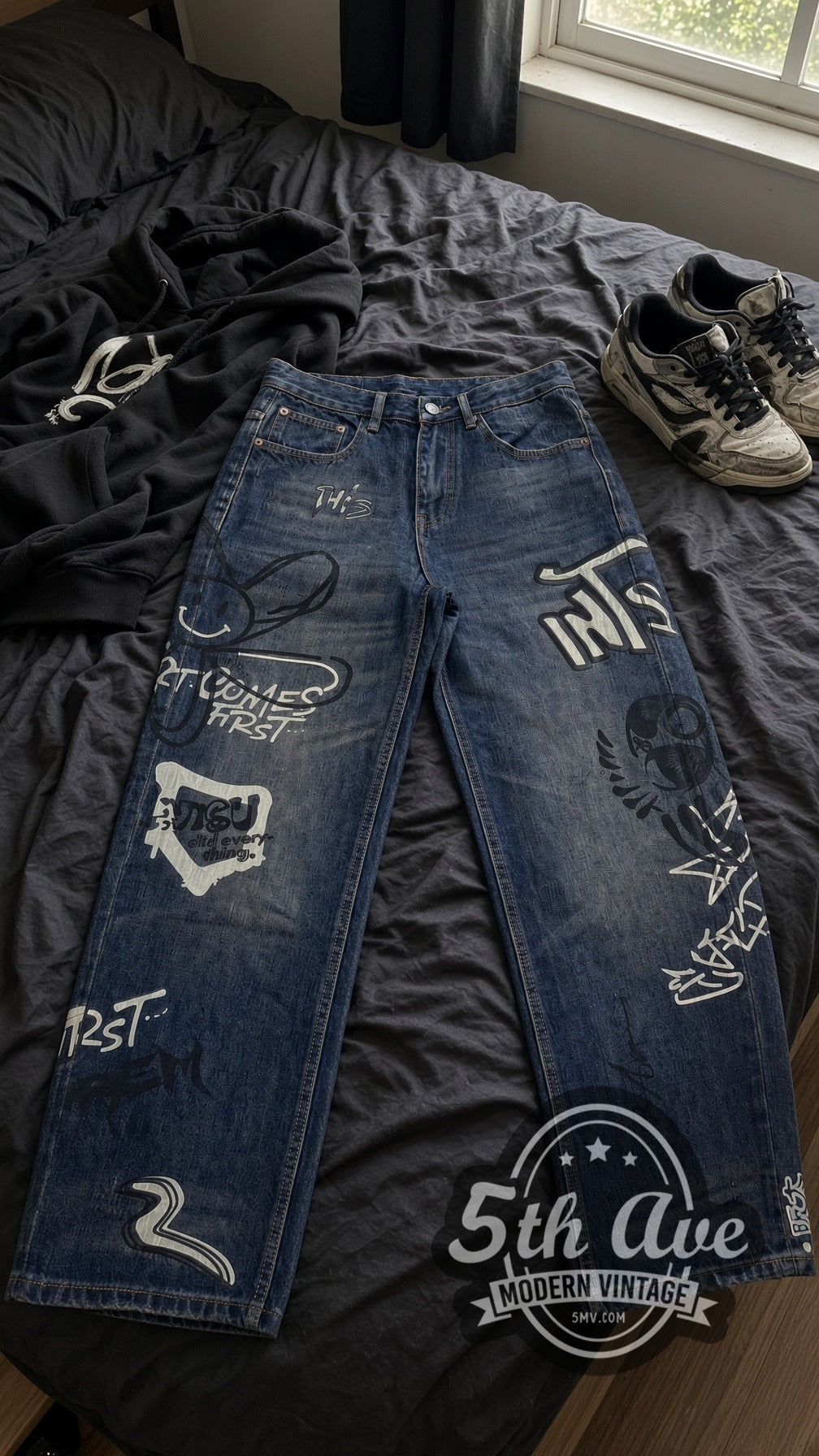 Dark Graffiti Bunny Skull Streetwear Jeans – Vintage Style vintage jeans laid on bed