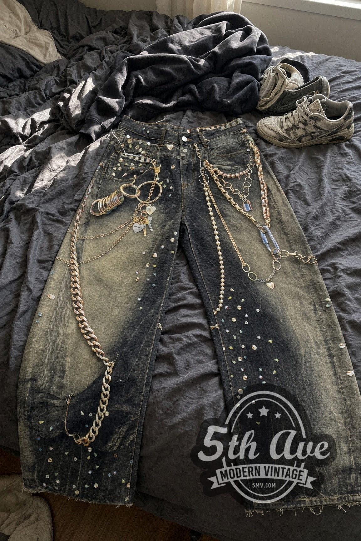 Dirty Wash Trompe L'oeil Jewelry Print Streetwear Jeans – Vintage Style vintage jeans laid on bed