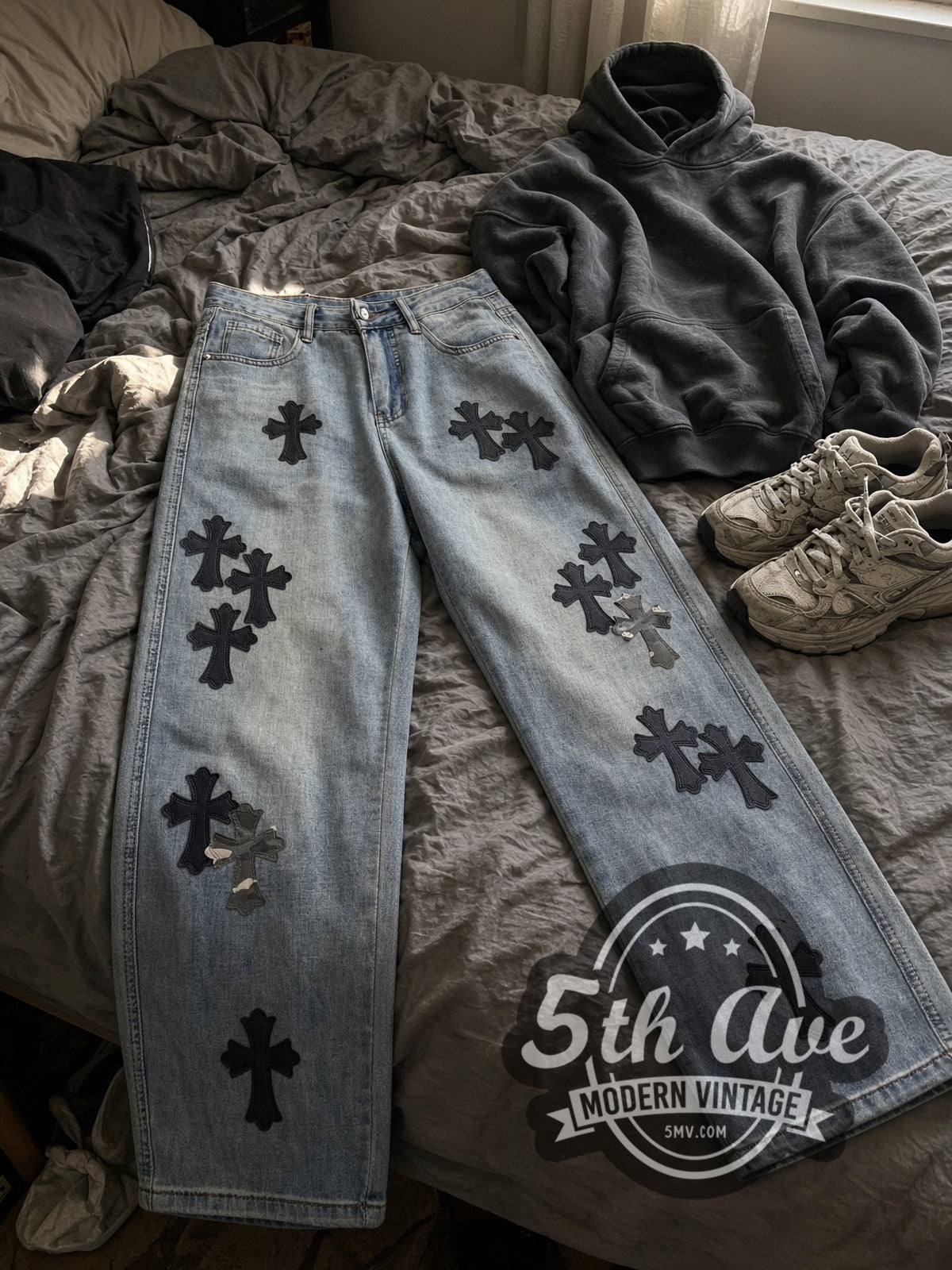 Light Wash Black + Camo Cross Patch Streetwear Jeans – Vintage Style vintage jeans laid on bed